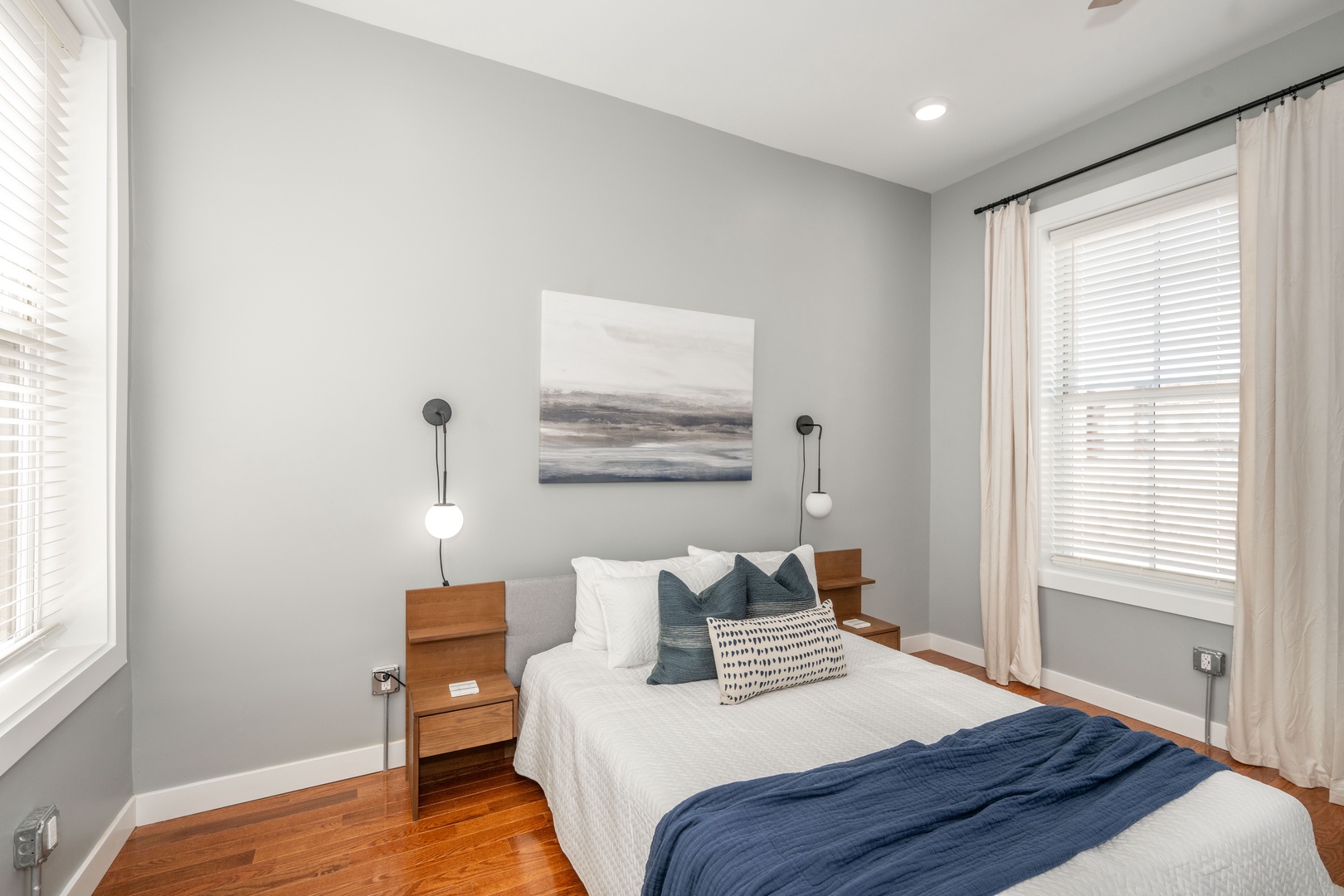 This serene queen suite features a private ensuite bath & Smart TV