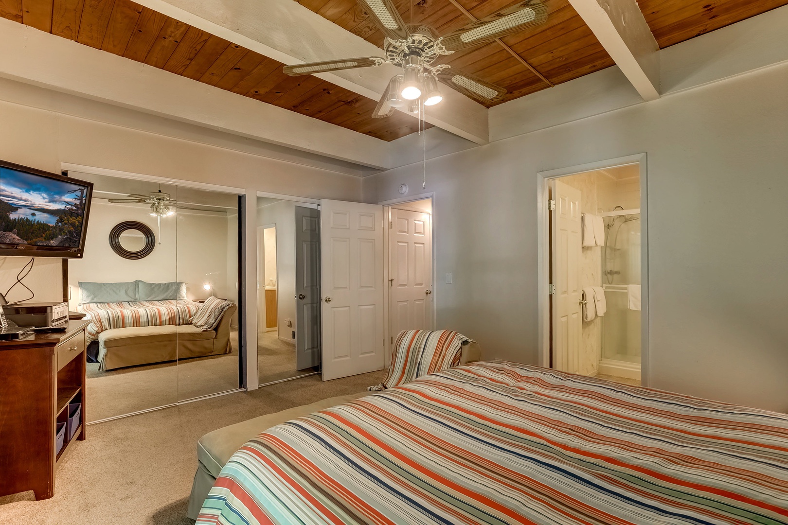 Master bedroom: King bed, cable TV, DVC player, private balcony (upstairs)
