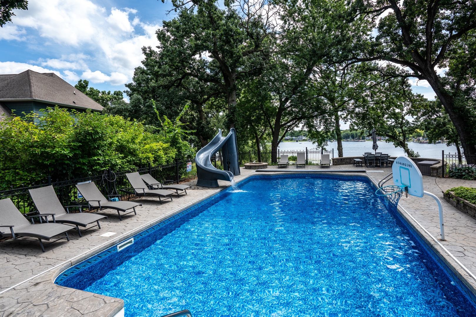 Take a dip in the serene private pool with waterslide!