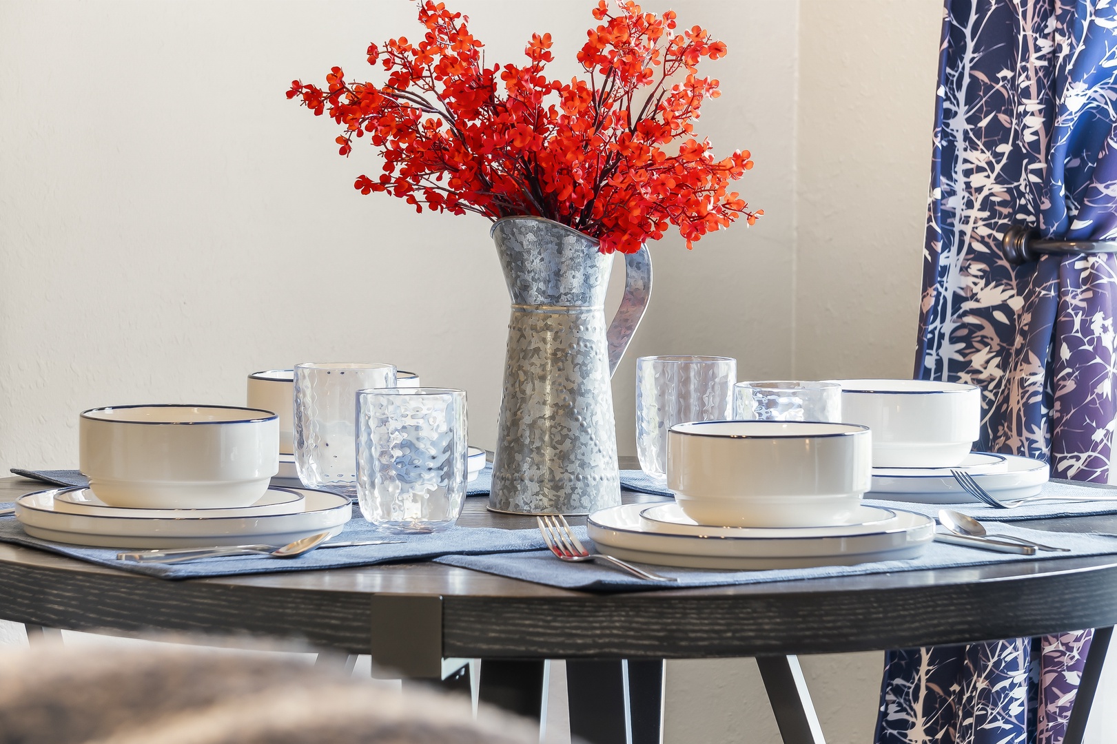 Gather for meals together at the chic dining table, seating 4