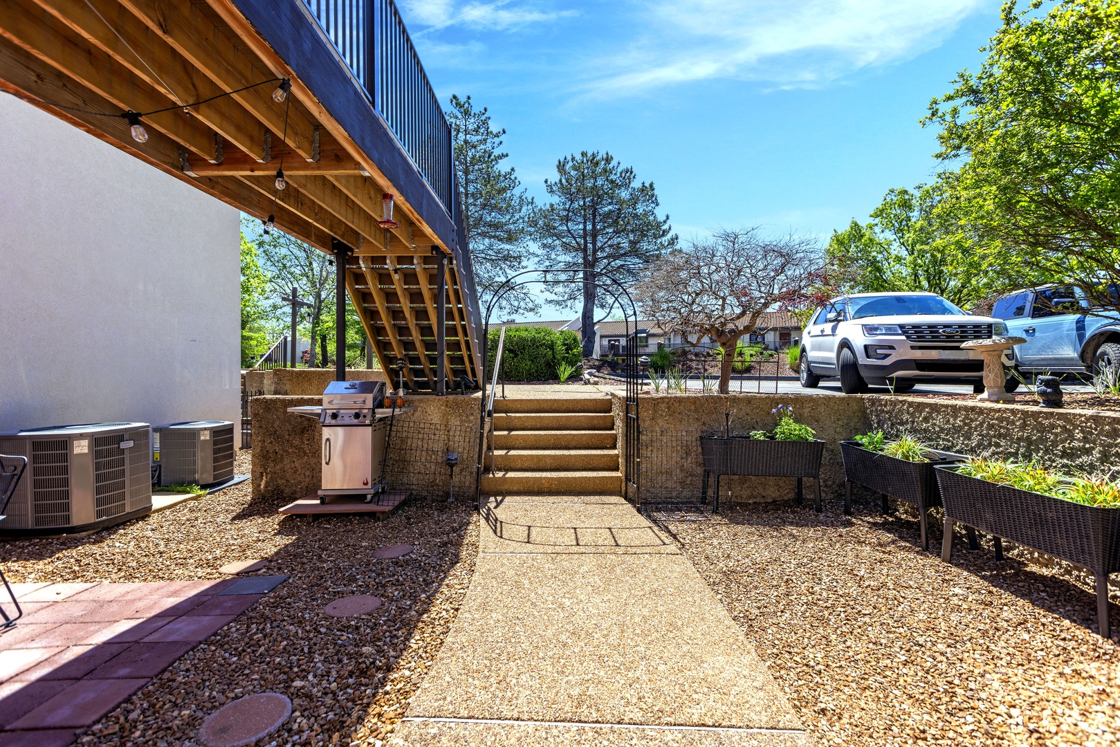 Savor leisurely afternoons on the patio, complete with a grill for outdoor cooking