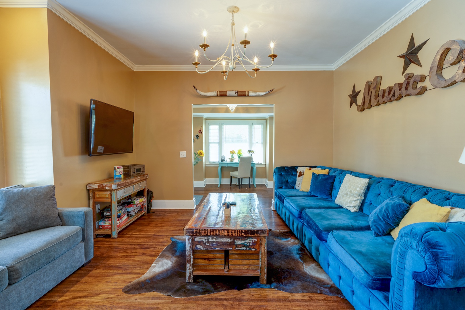 Cozy and spacious living area with TV