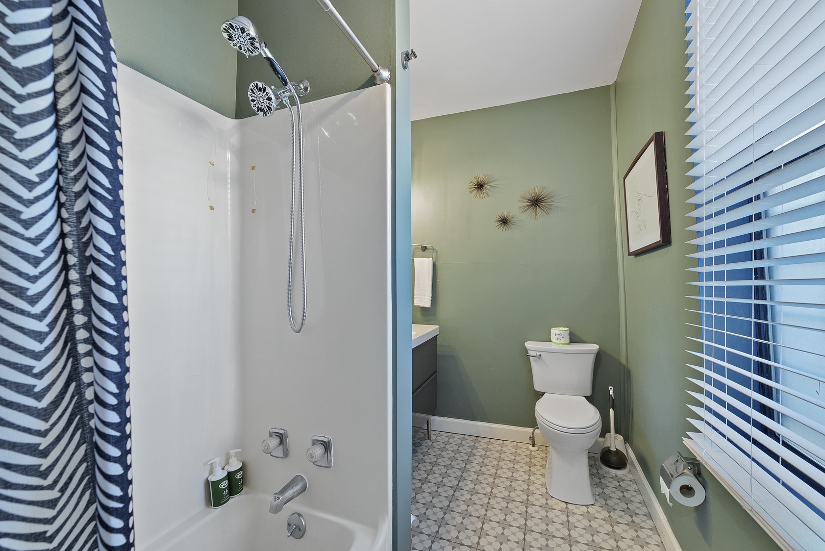 Refresh in the full bath, offering a single vanity & shower/tub combo