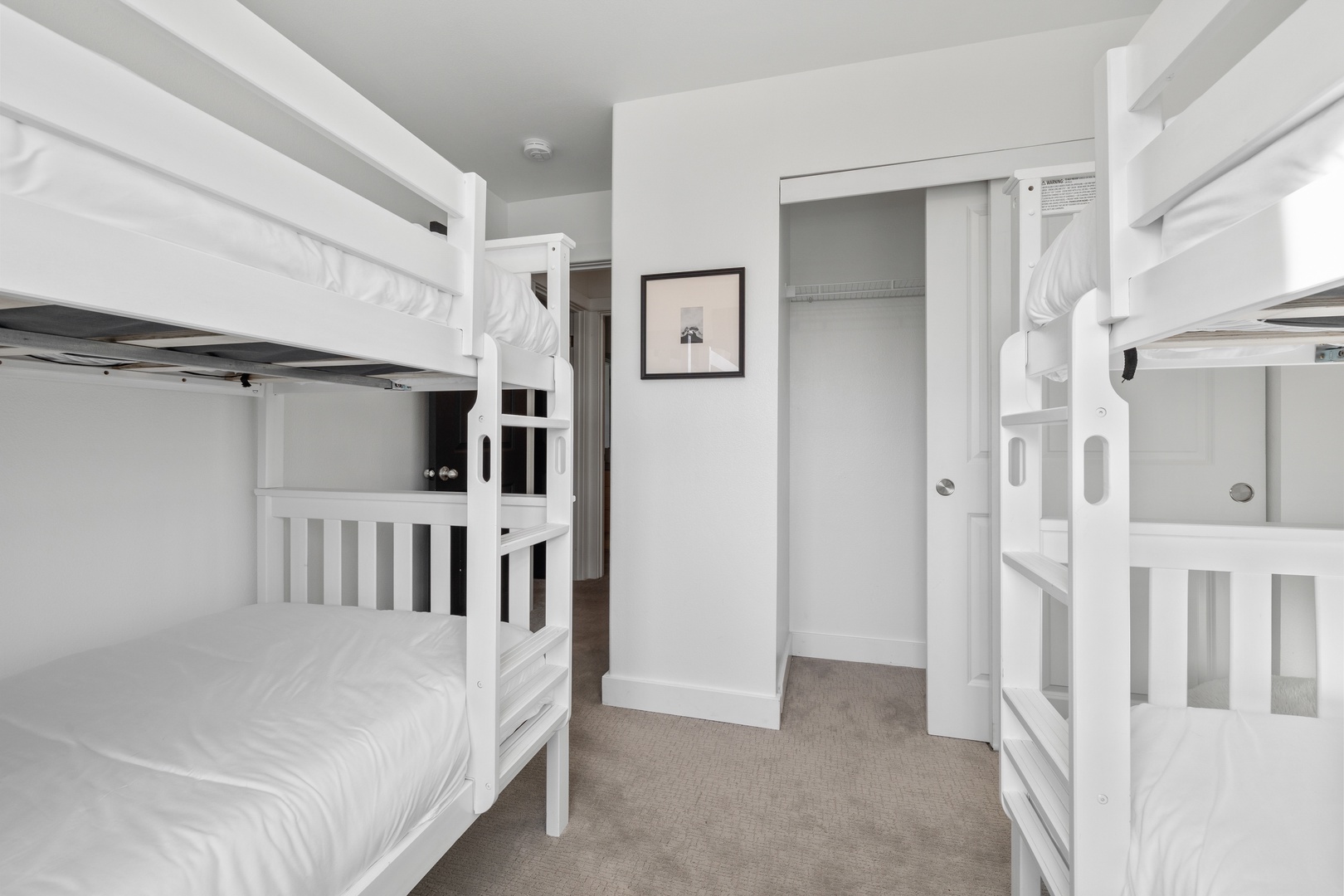 The final 2nd floor bedroom includes two twin-over-twin bunkbeds