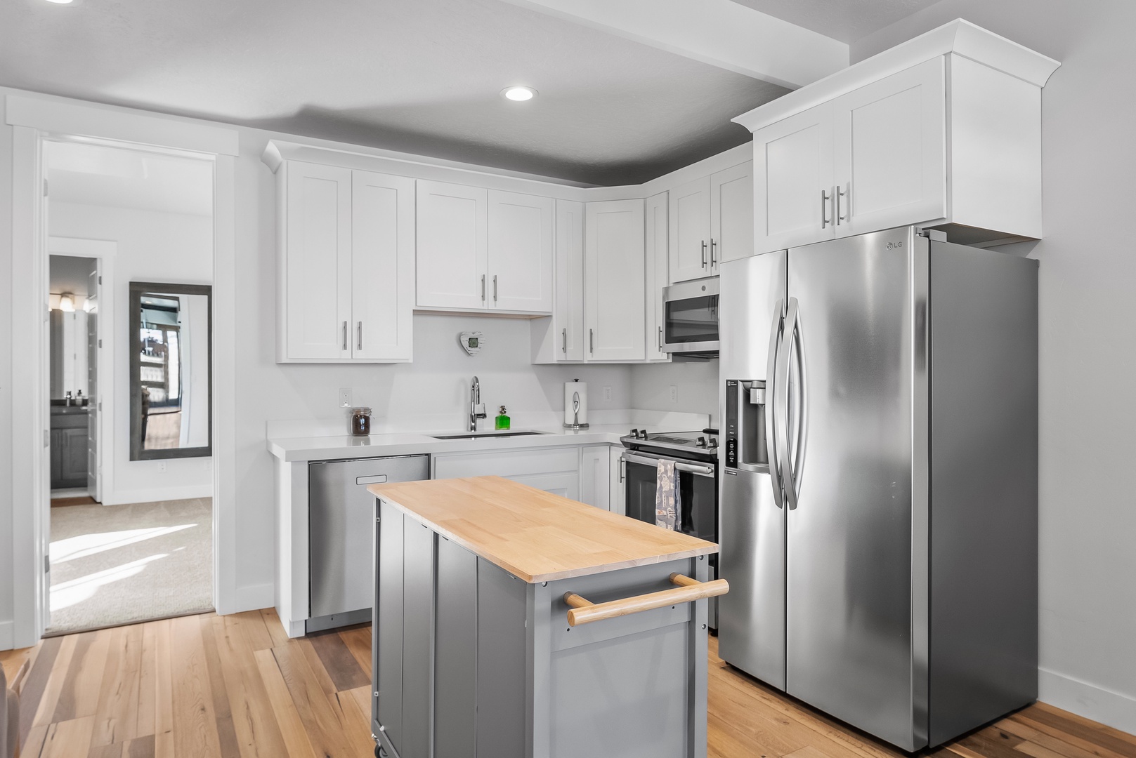 Whip up your favorite meals in the fully equipped kitchen with stainless steel appliances