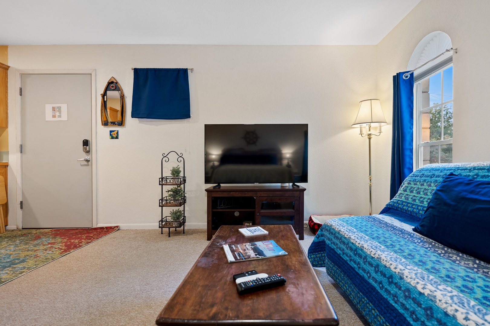 Curl up in bed or on the full sleeper sofa for a movie