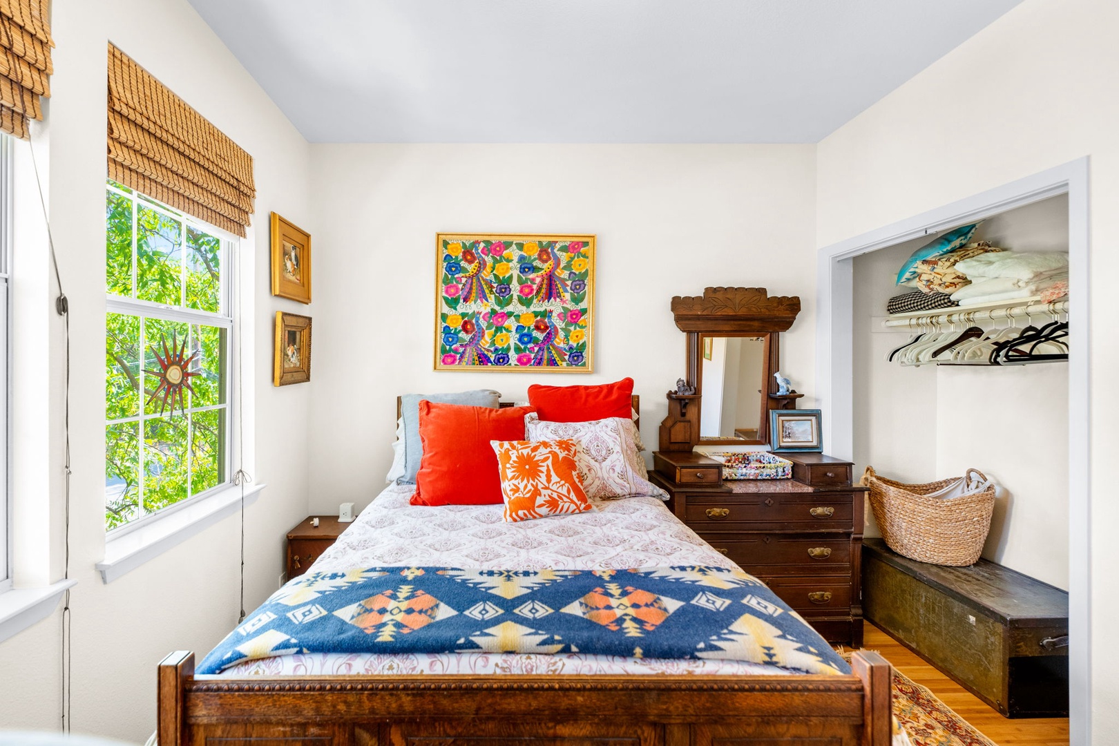 The 2nd floor secondary queen bedroom is the perfect boho retreat