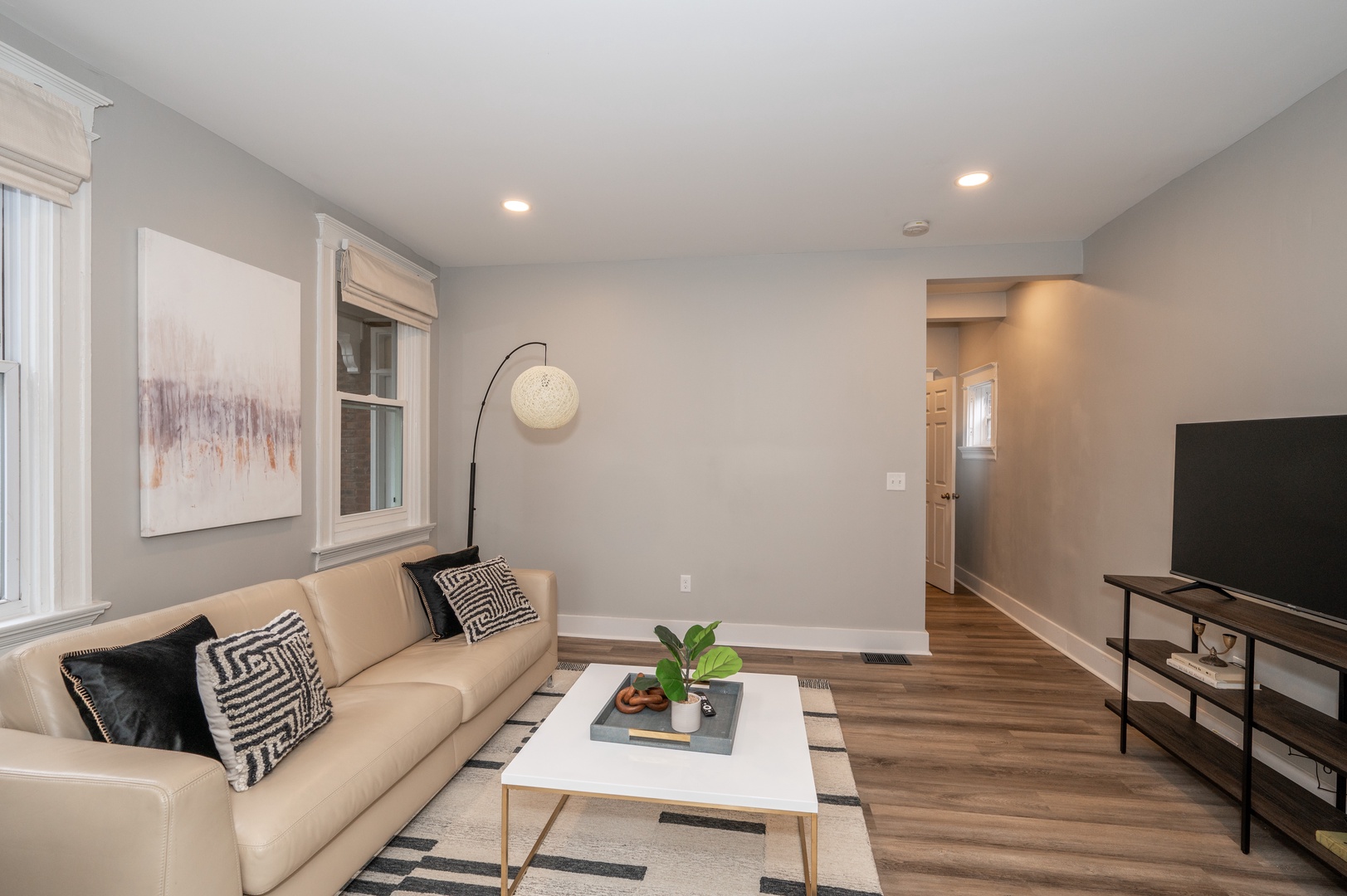 Apt 1 – The living room is the perfect spot to relax & enjoy a movie or a show