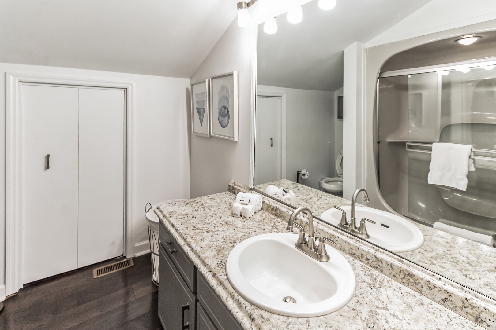 The 2nd floor full bathroom includes a large vanity & shower/tub combo
