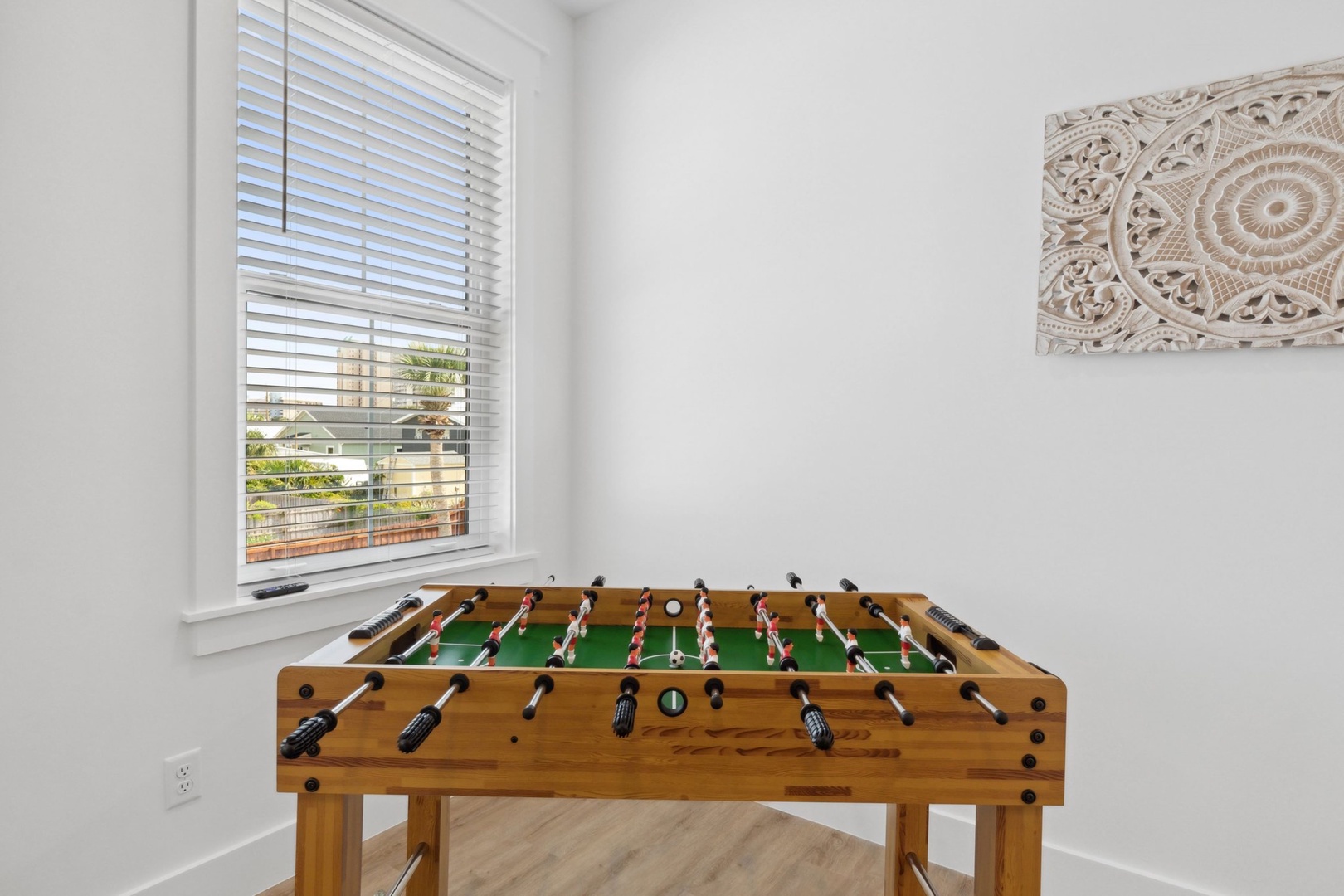 Delight in a spirited game of foosball.