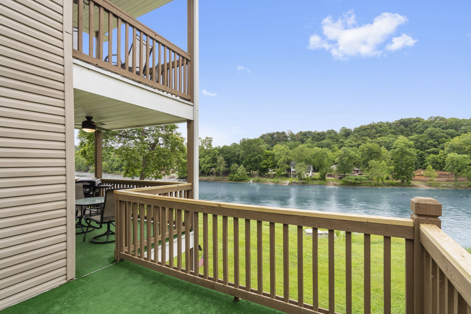 Enjoy the fresh air on the private deck overlooking the lake