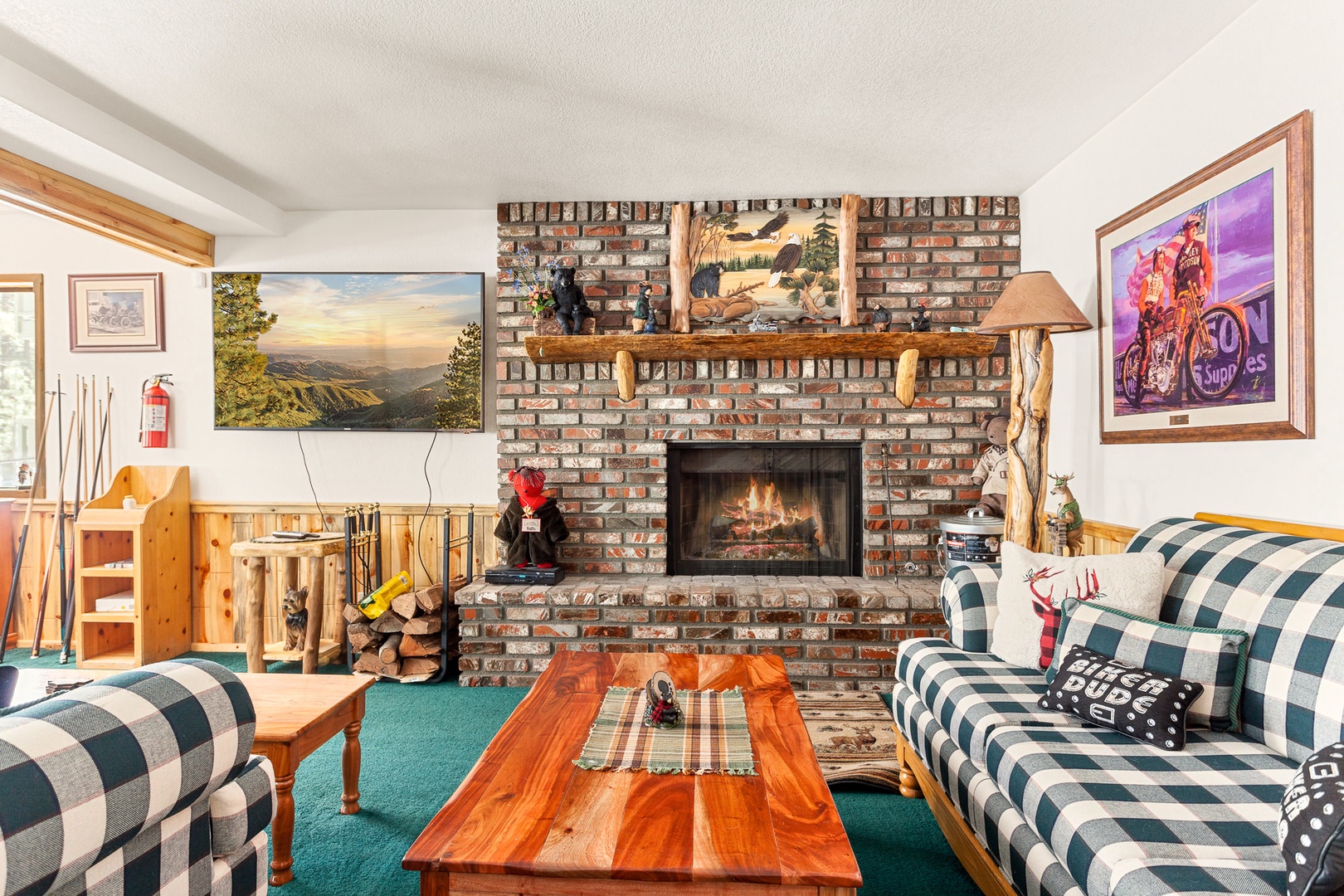 Game room with TV and fireplace