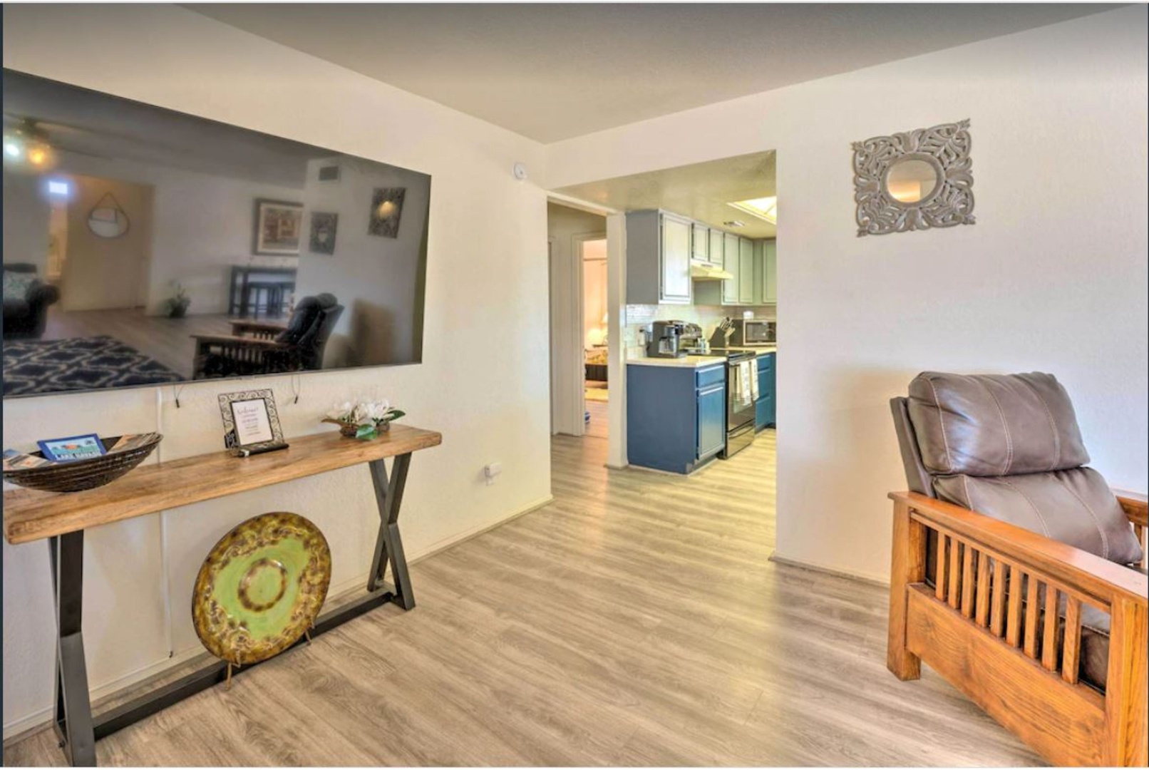 Living room with Smart TV, and ample seating