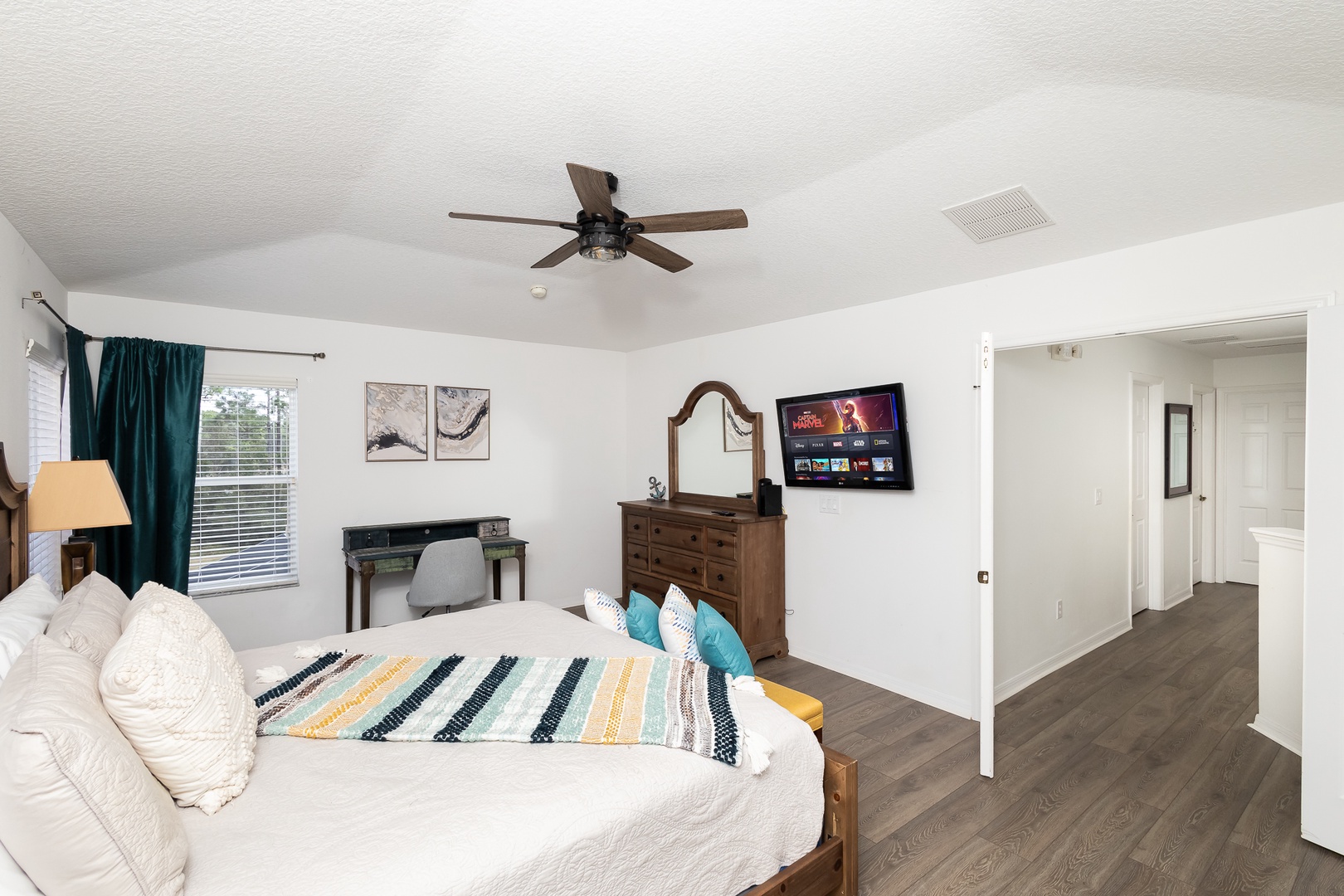 The 2nd-floor king suite offers a private ensuite with walk-in closet & Smart TV