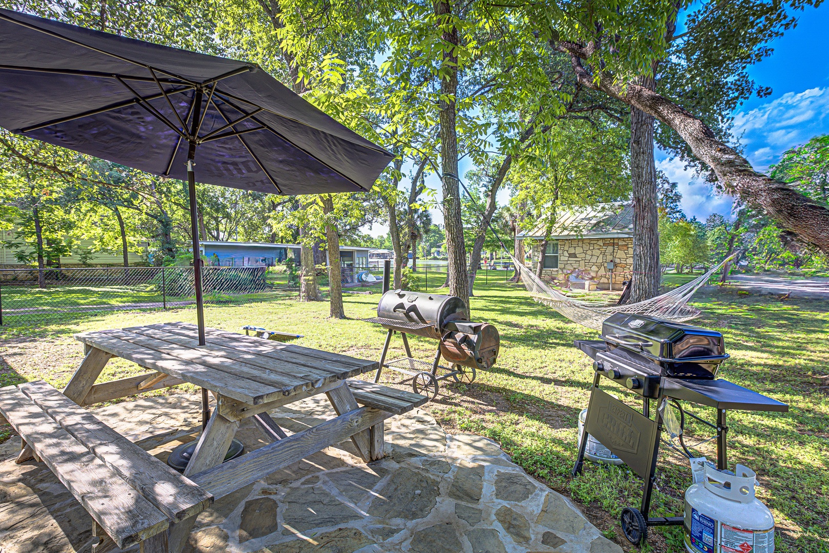 Outdoor dining, hammock, BBQ grill, cornhole