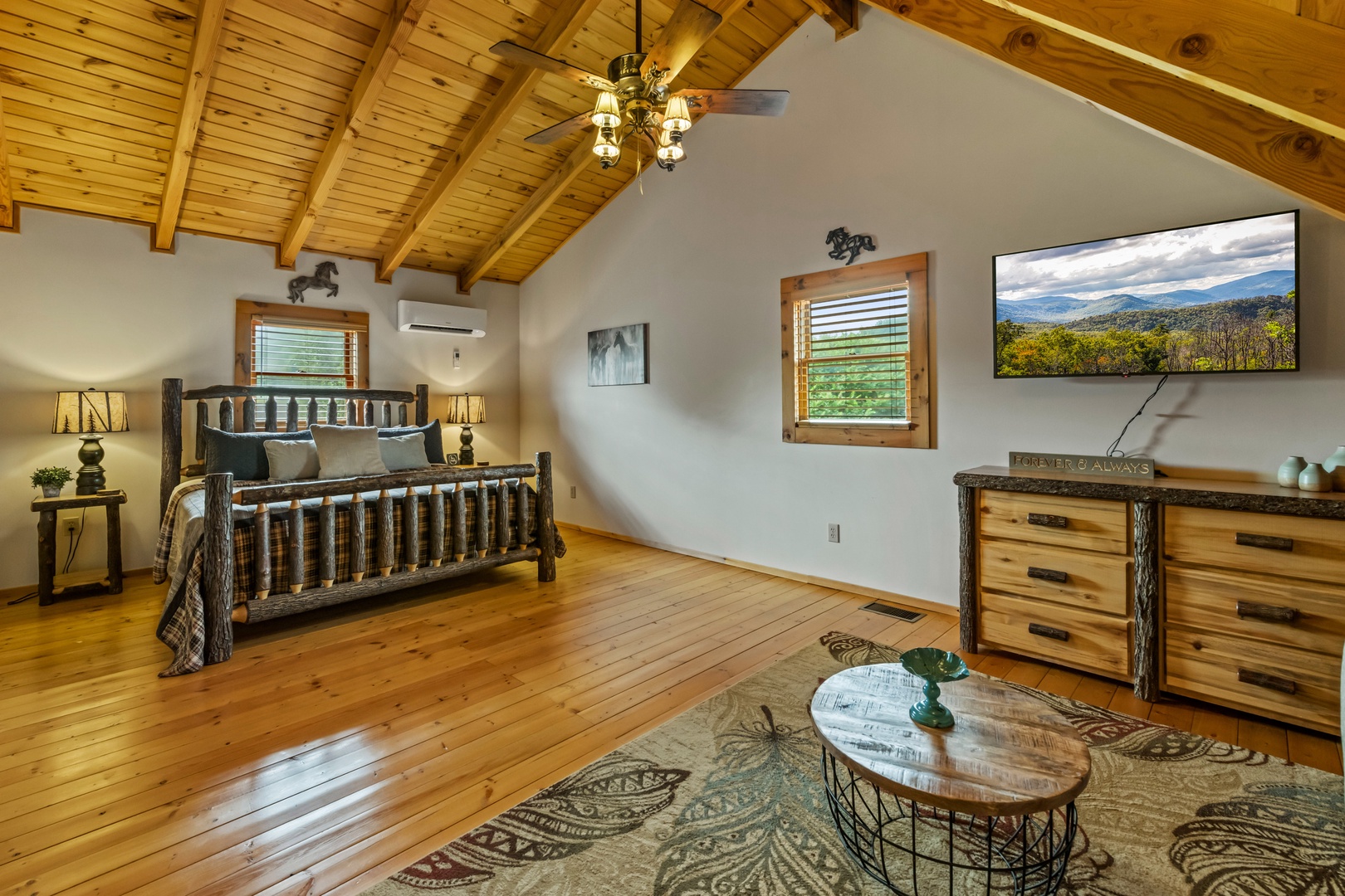 The second-floor bedroom sanctuary showcases a king bed & smart TV