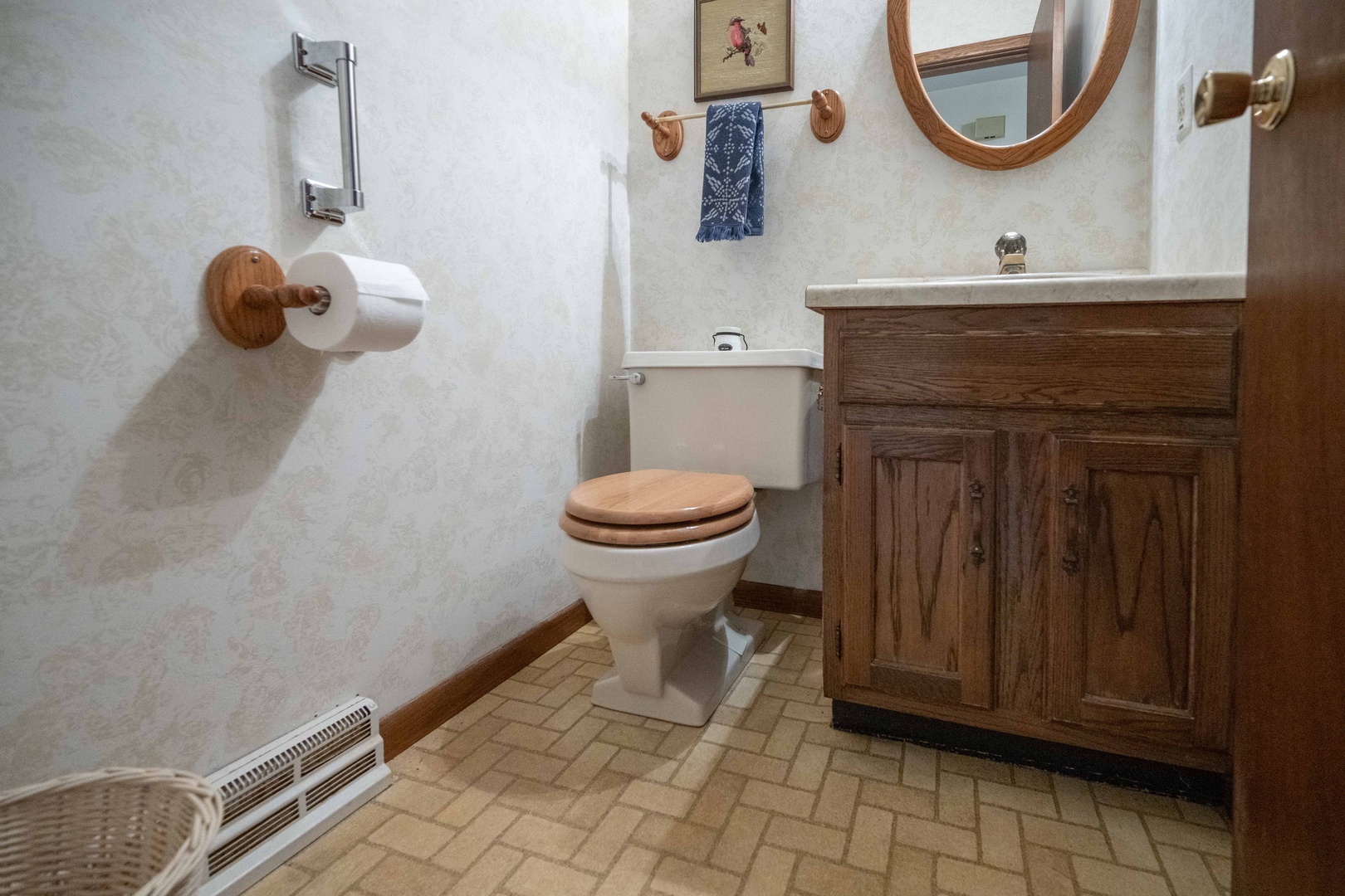 A convenient half bathroom is tucked away on the first floor