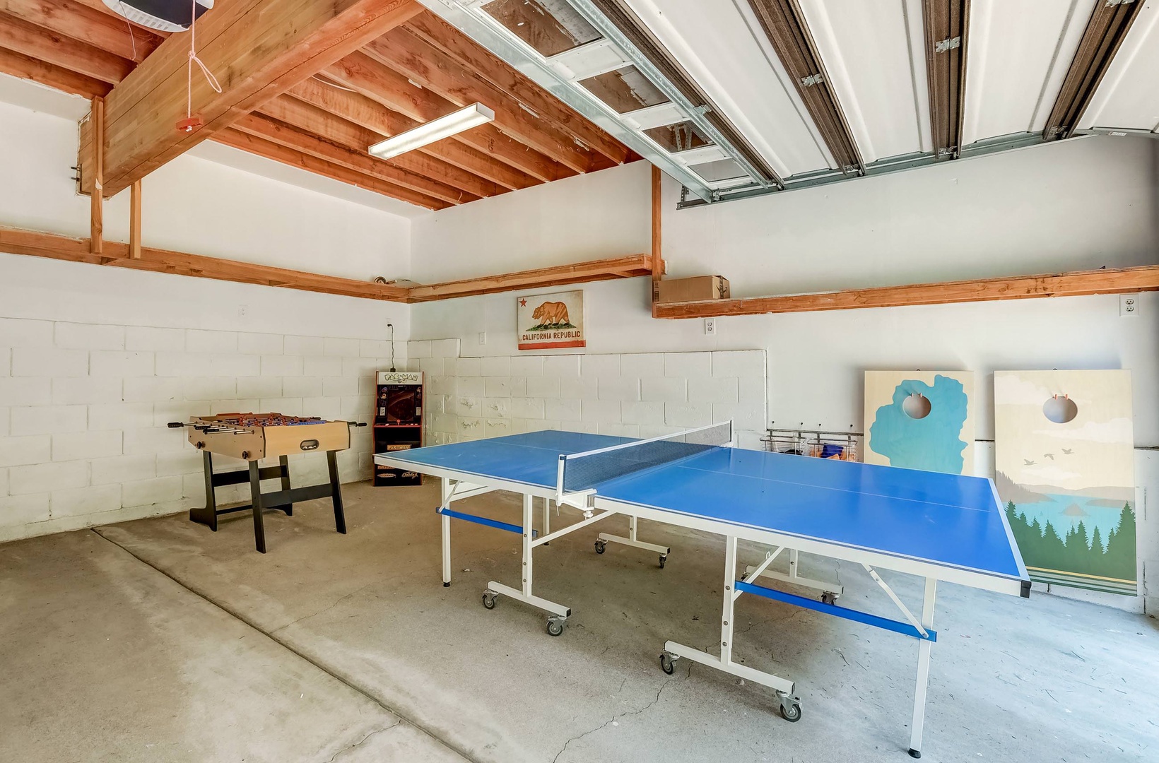 Game room with ping pong table, foosball table