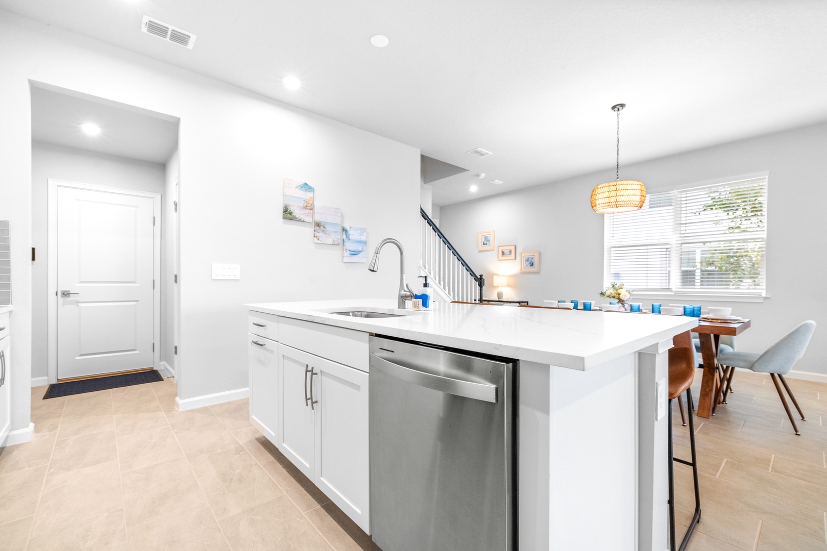 The open, airy kitchen offers ample space & all the comforts of home