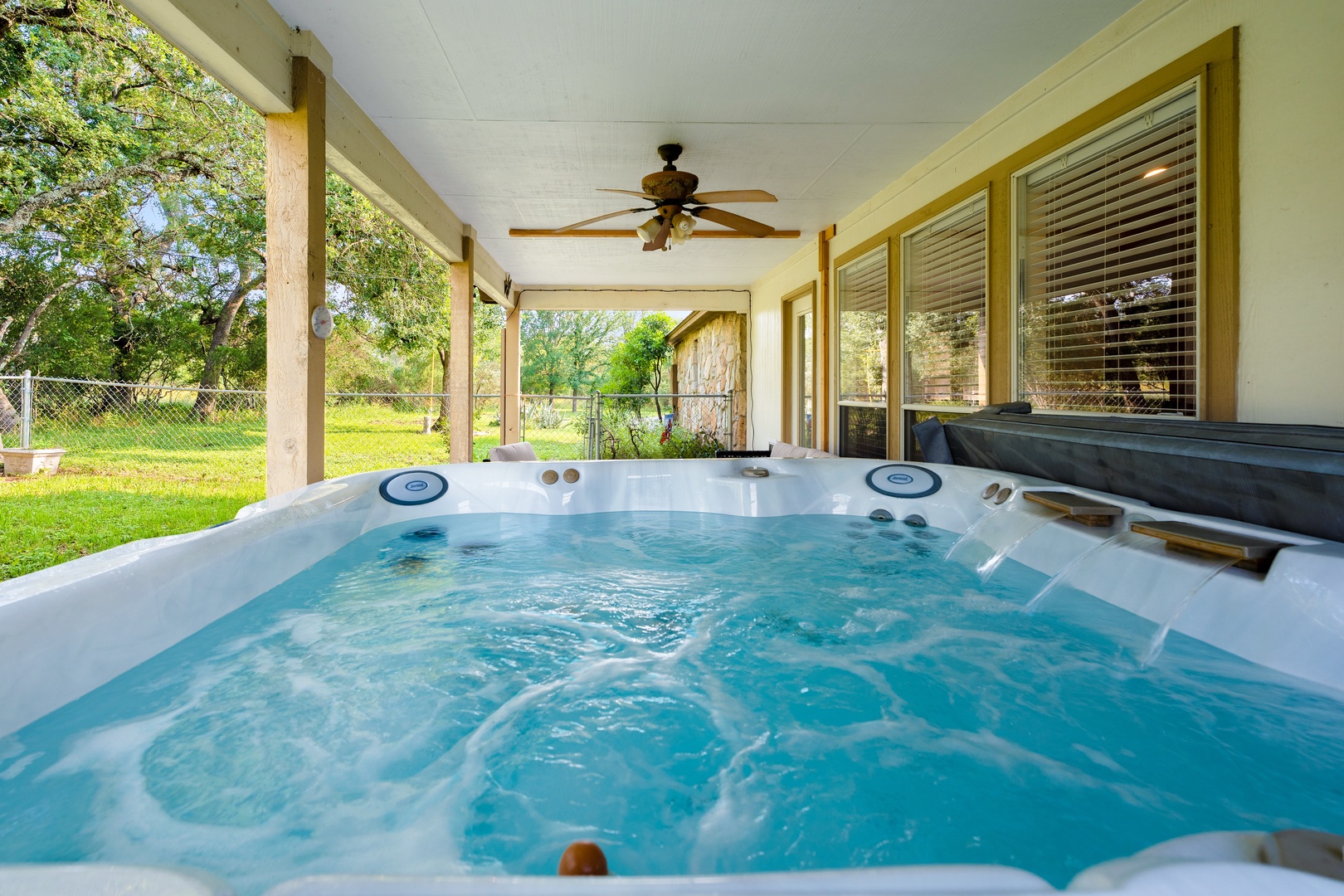 Soak the day away in the covered, private hot tub