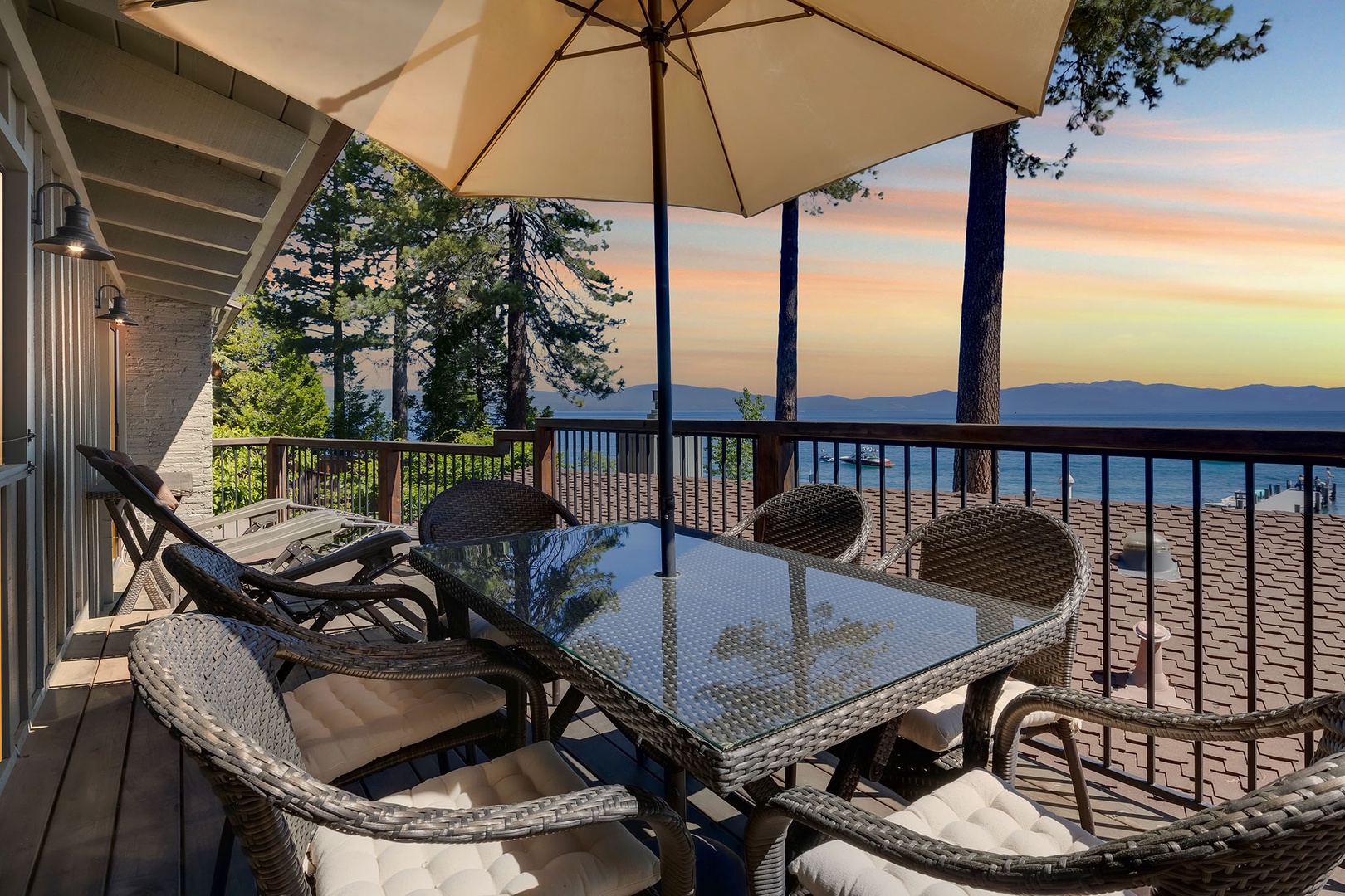 Lounge chairs and outdoor dining in the balcony