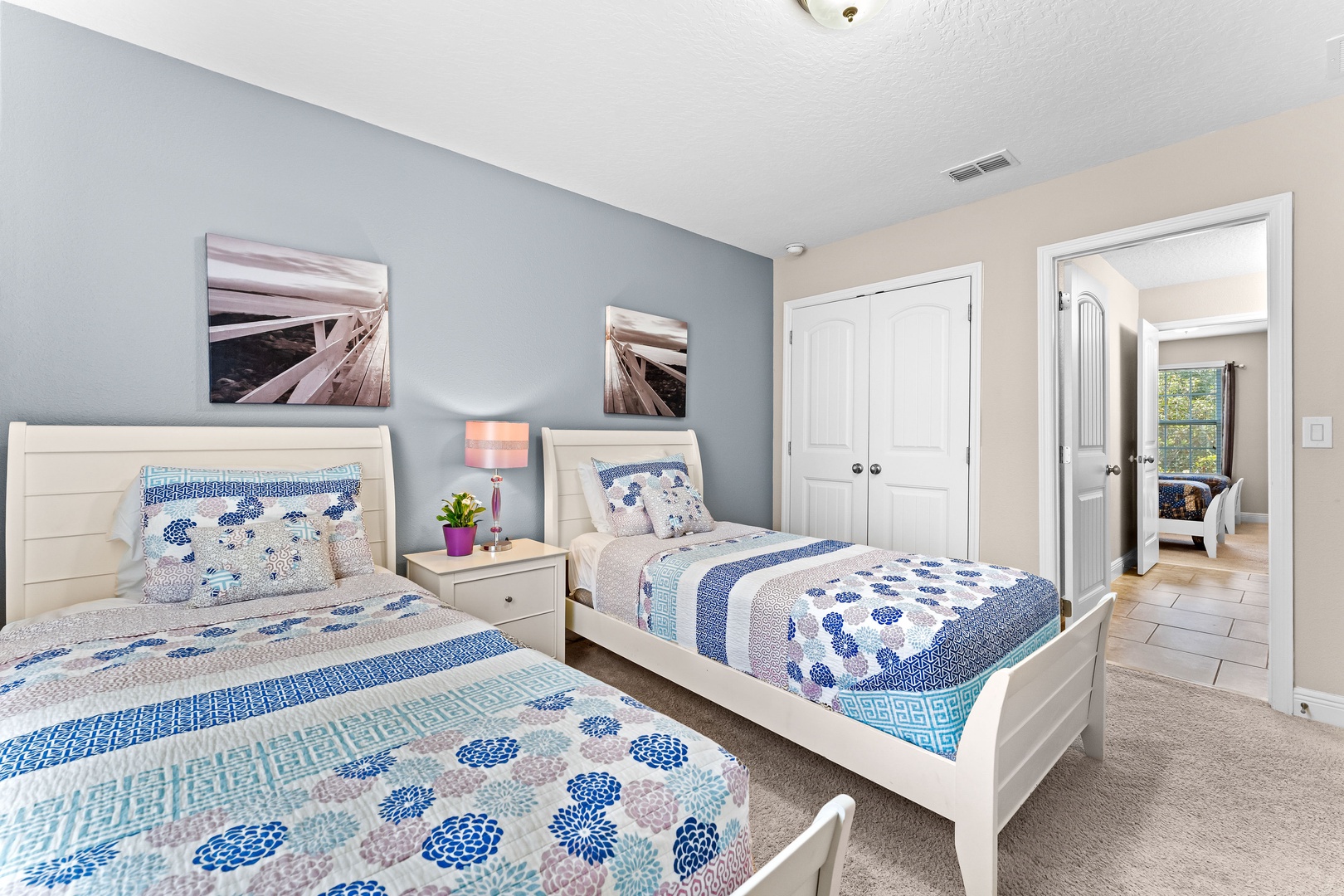 Bedroom 3 with 2 twin beds, Smart TV, and Jack & Jill style ensuite