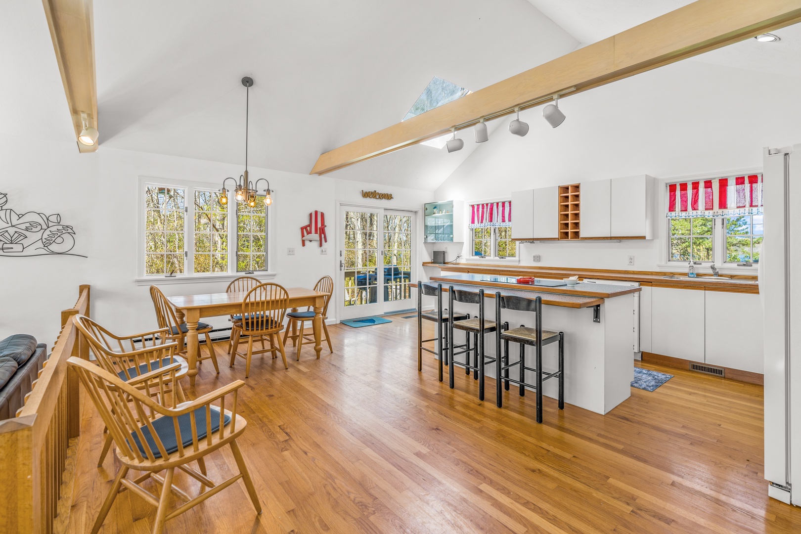 The bright, open kitchen offers ample space & all the comforts of home