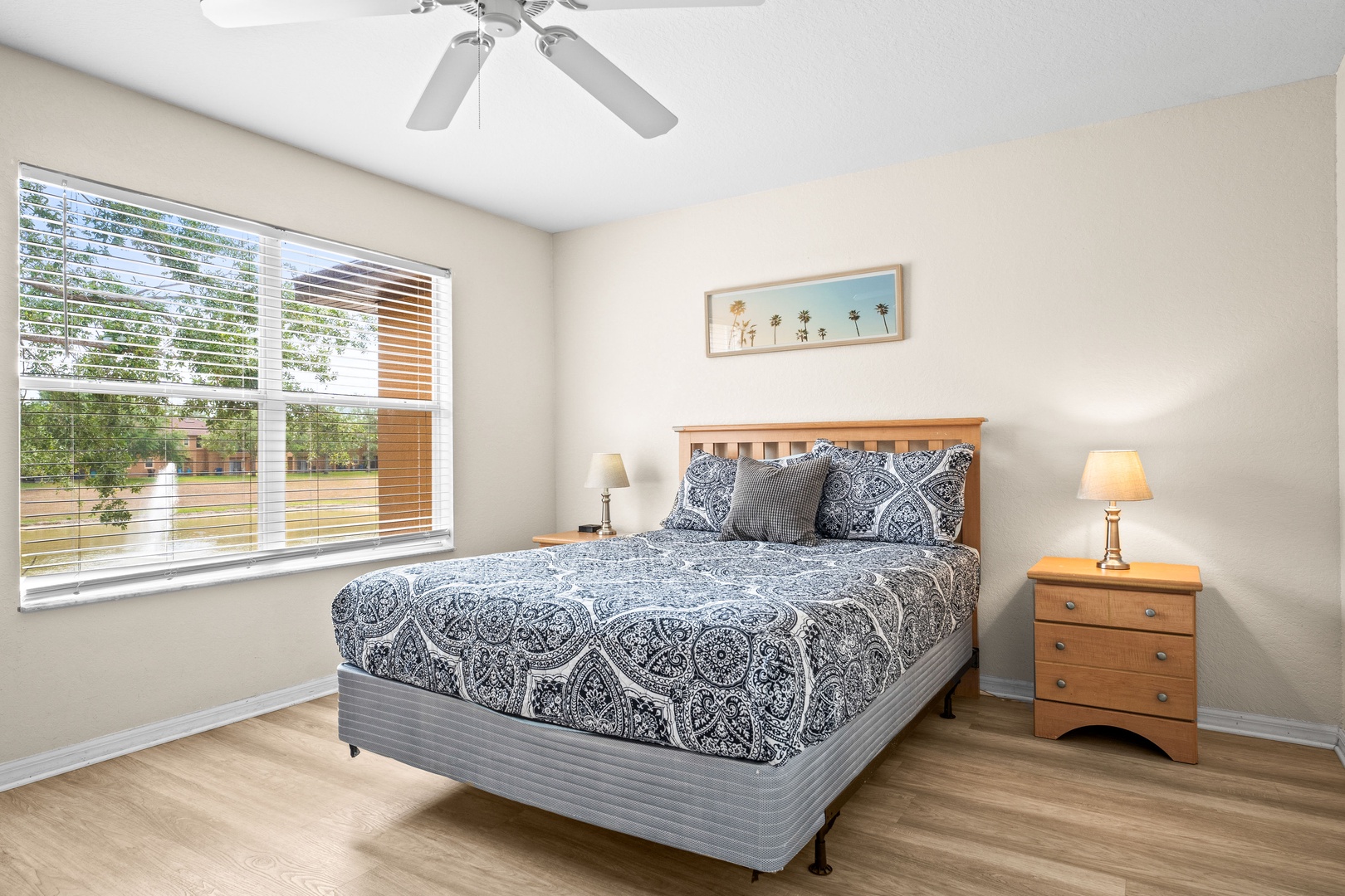 This queen suite boasts an ensuite, smart TV, & ceiling fan