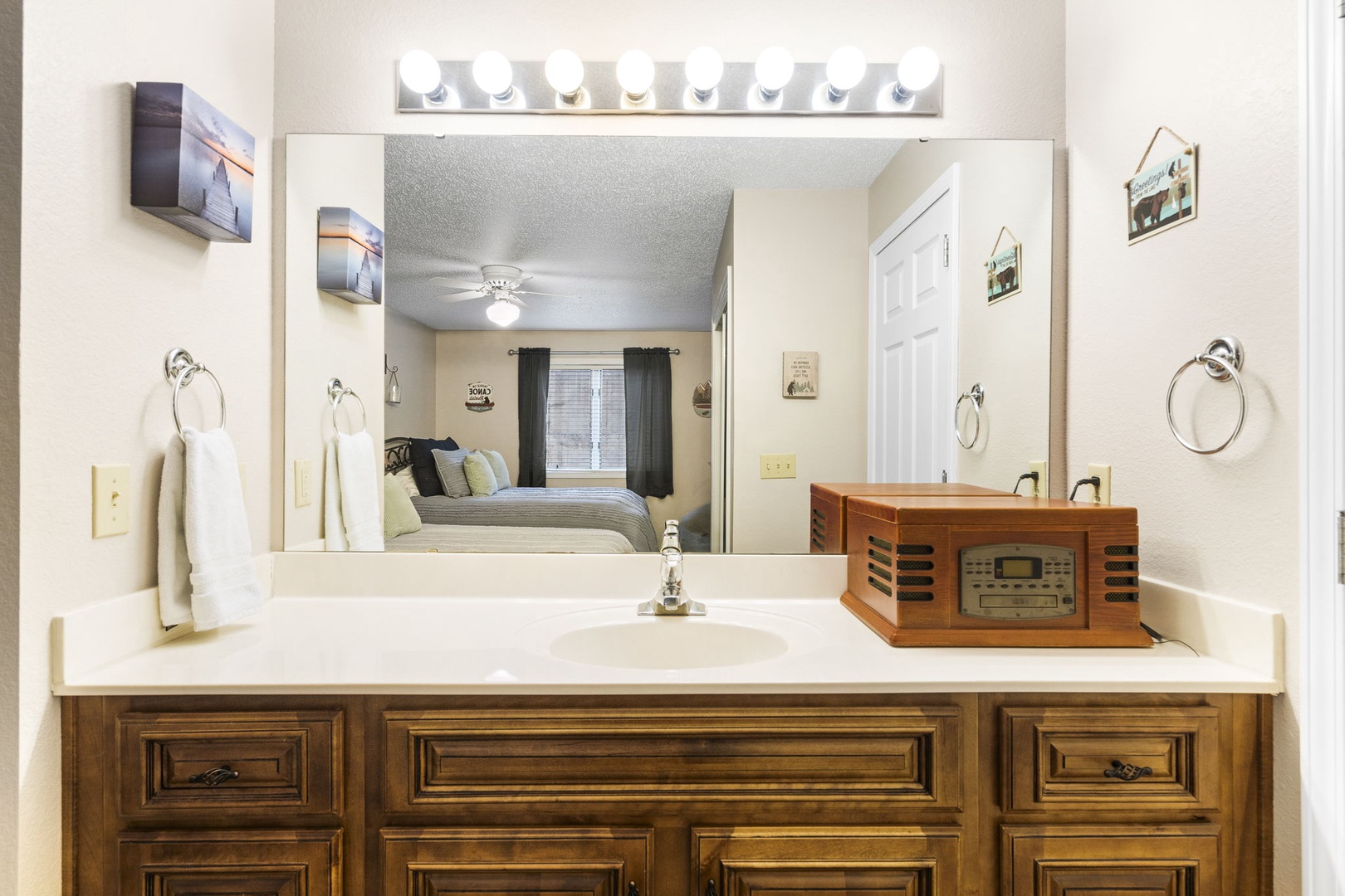 The 2nd ensuite bathroom offers a large single vanity & shower/tub combo