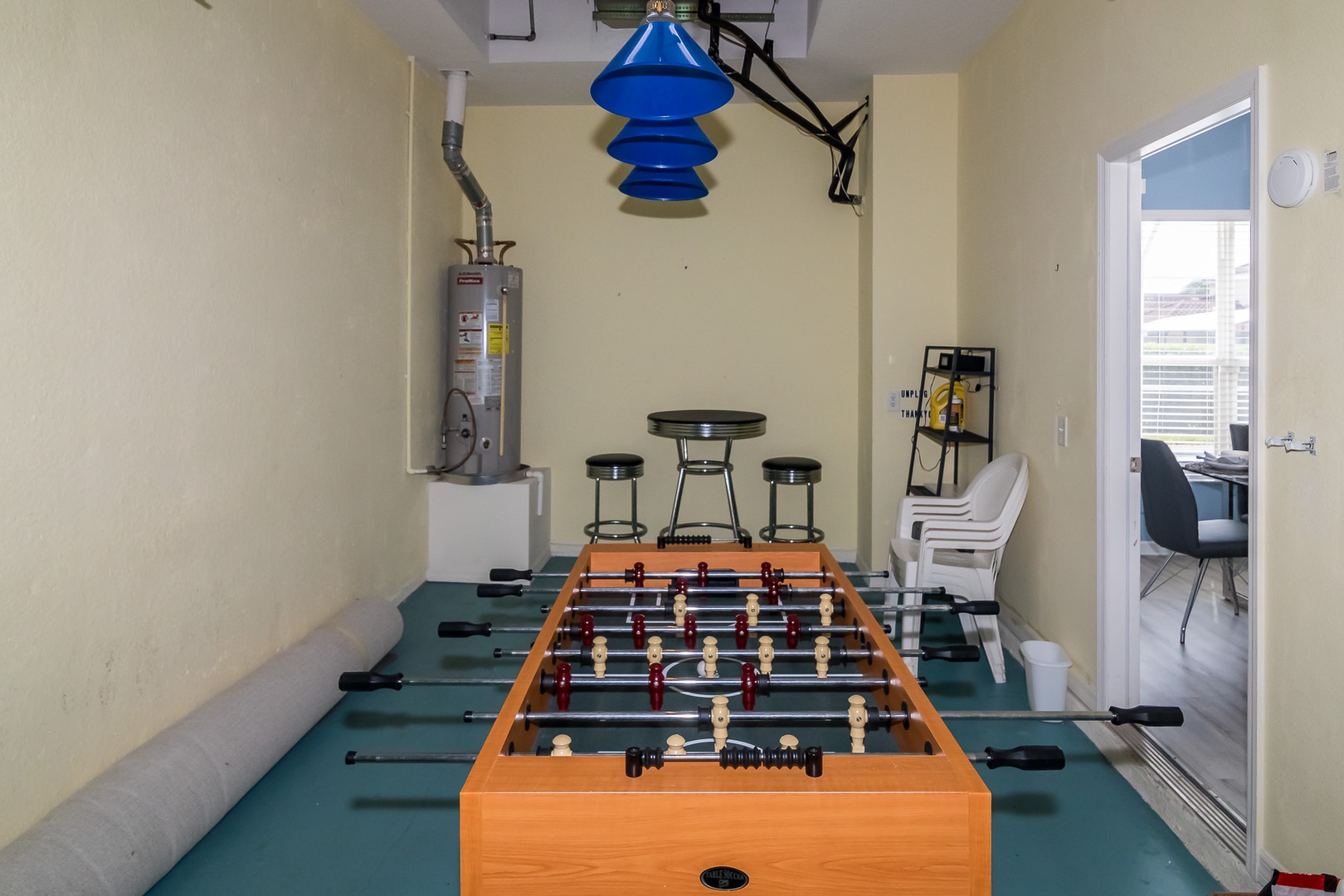 Game room with foosball table (garage)