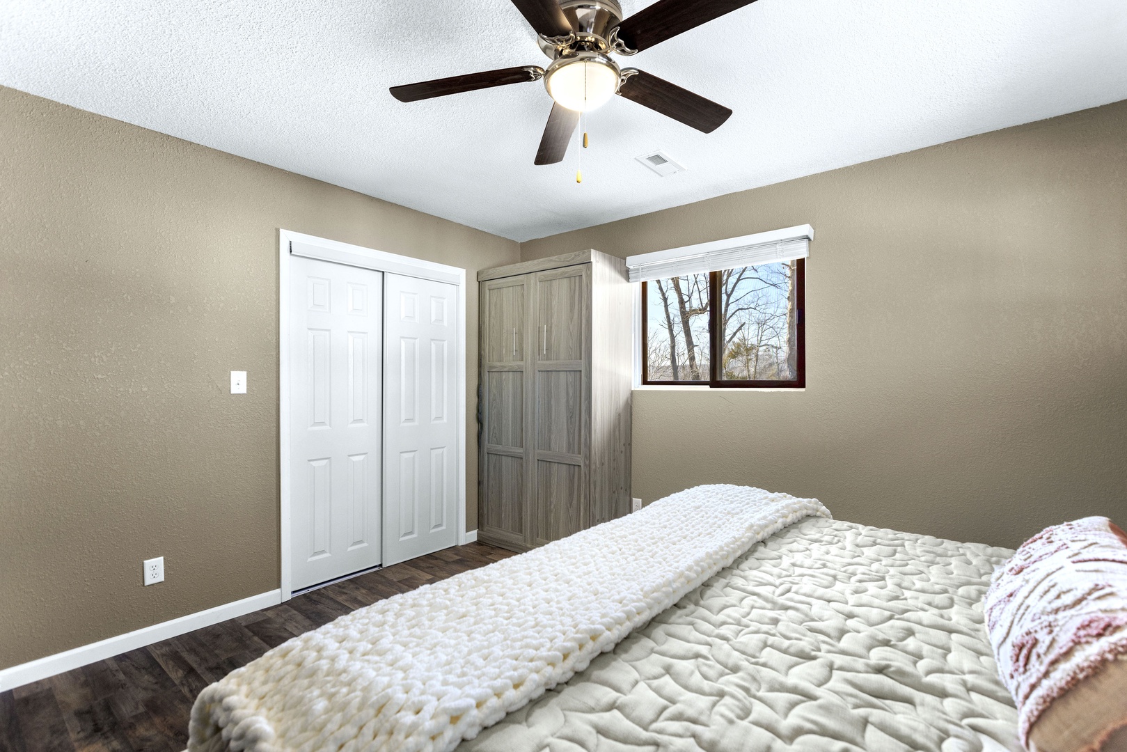 The 1st of 6 spacious bedrooms offers a king bed & twin murphy bed