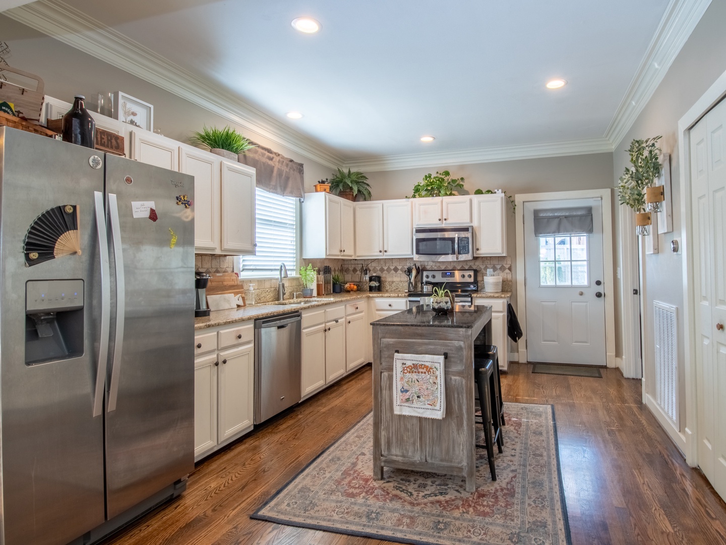Full kitchen with stainless steel appliances