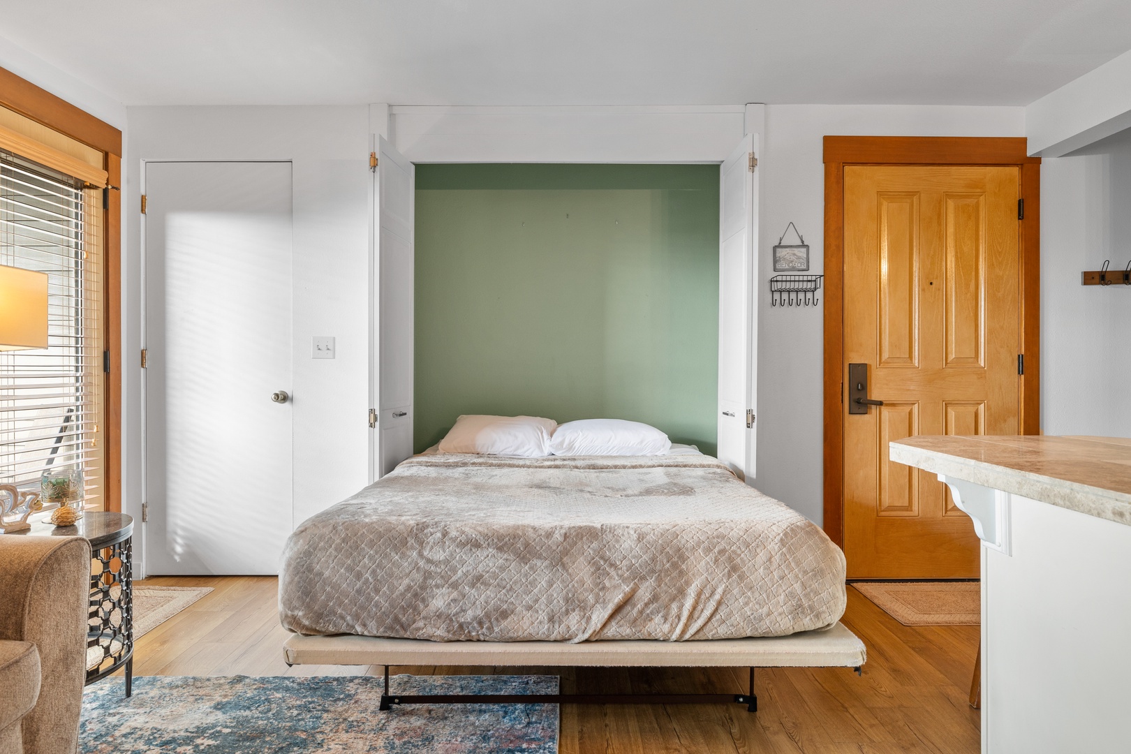 Open up the queen-sized Murphy bed when it’s time for a snooze