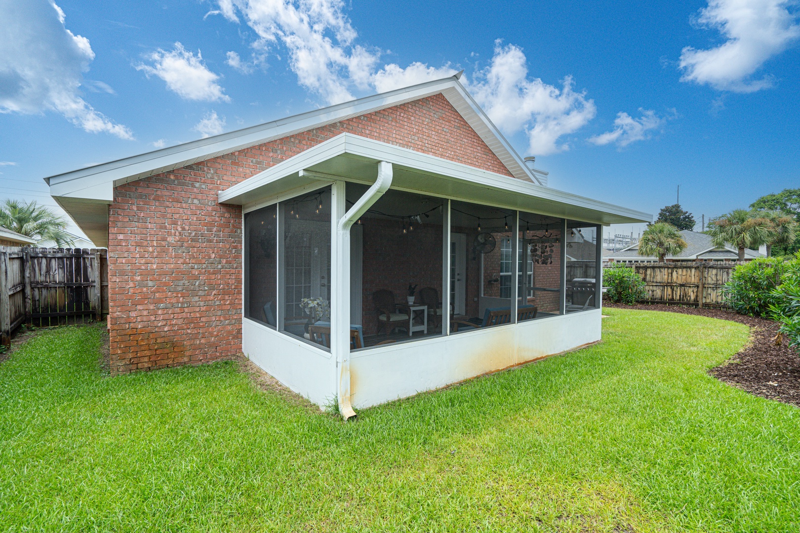 The large back yard offers loads of space for relaxation & play