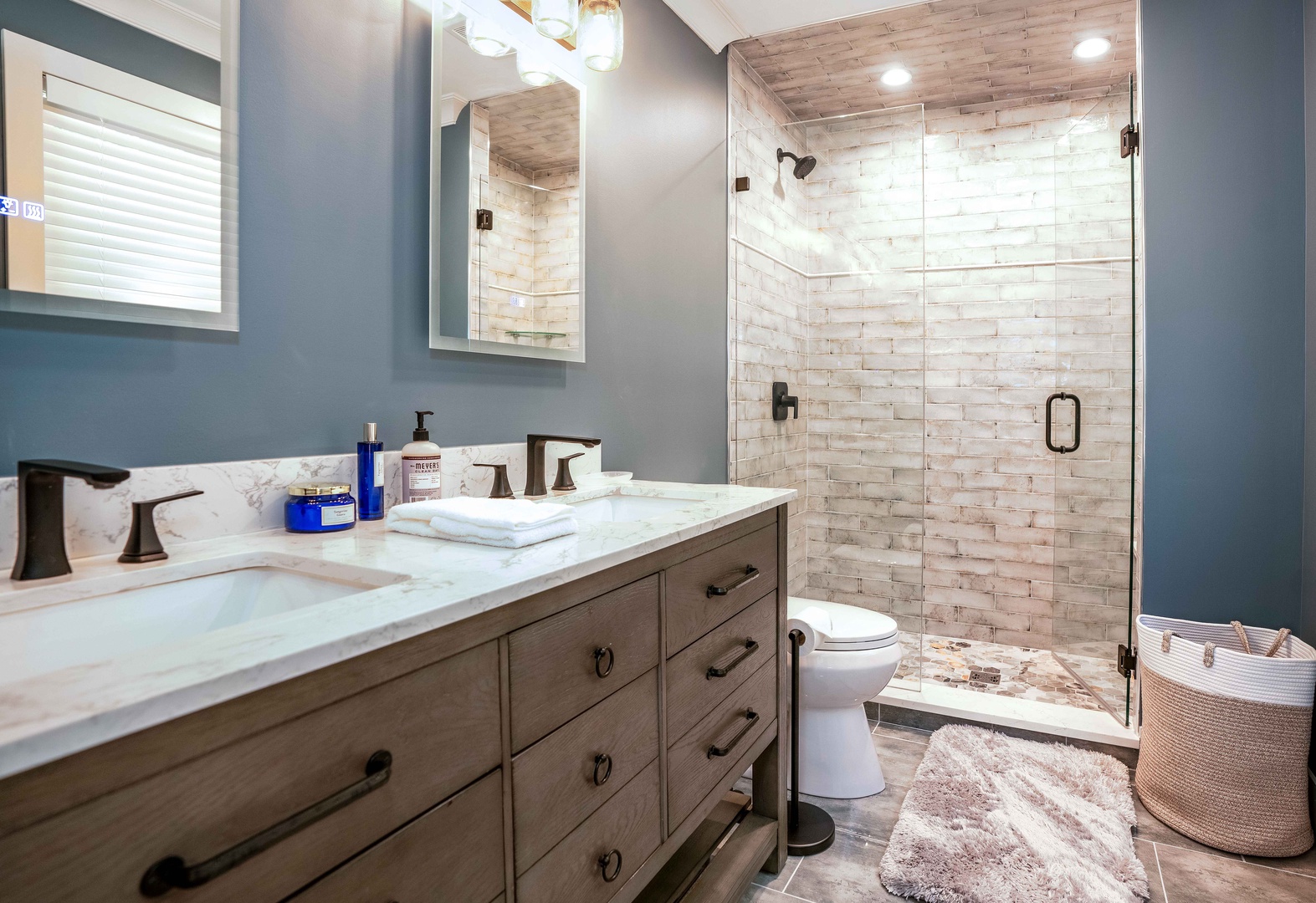 A double vanity & glass shower is available in the king ensuite