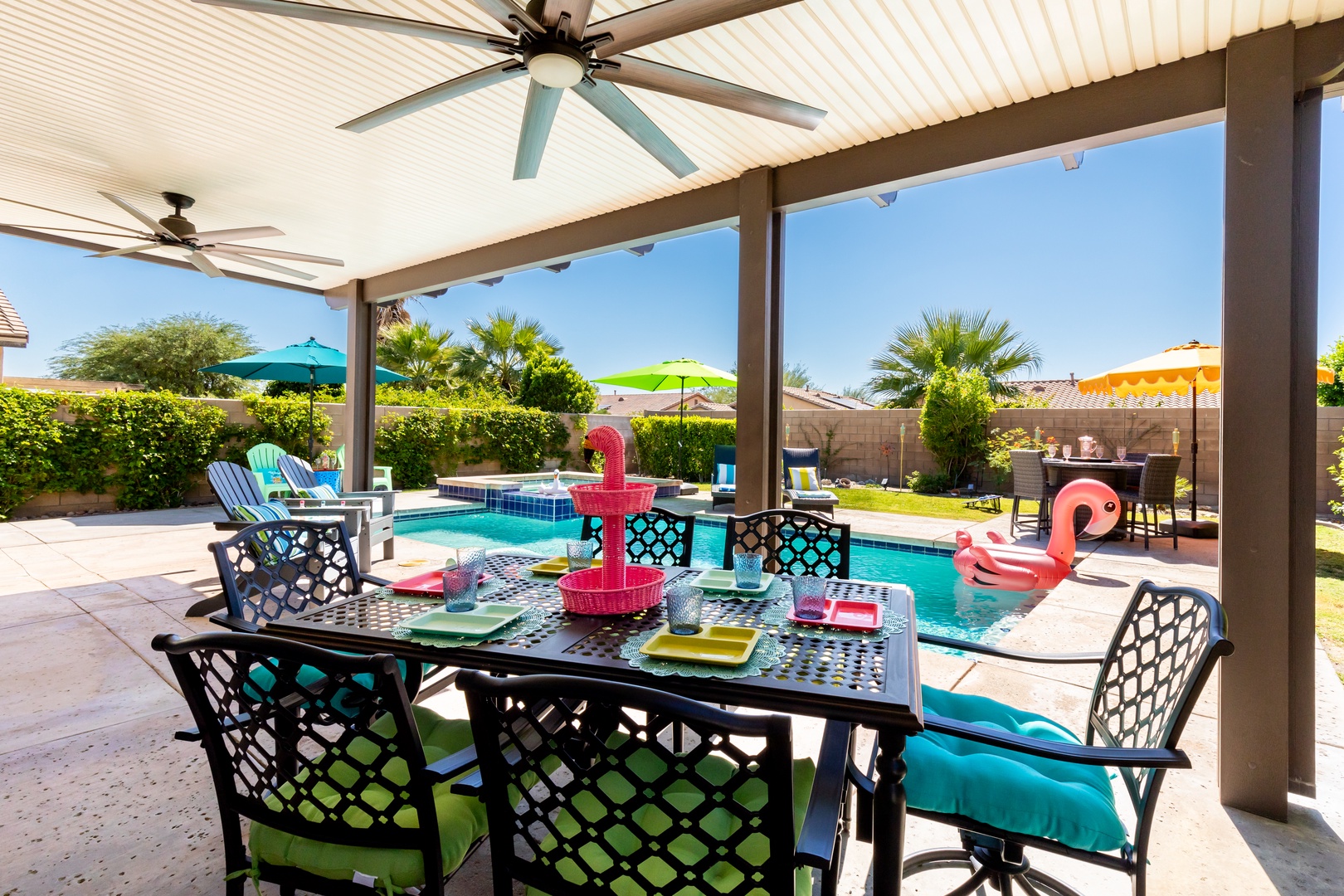 Outdoor dining with seating by the pool