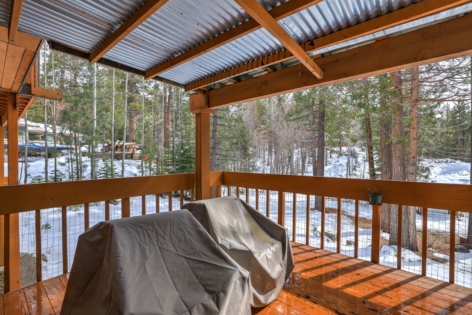 Lower covered deck with seating