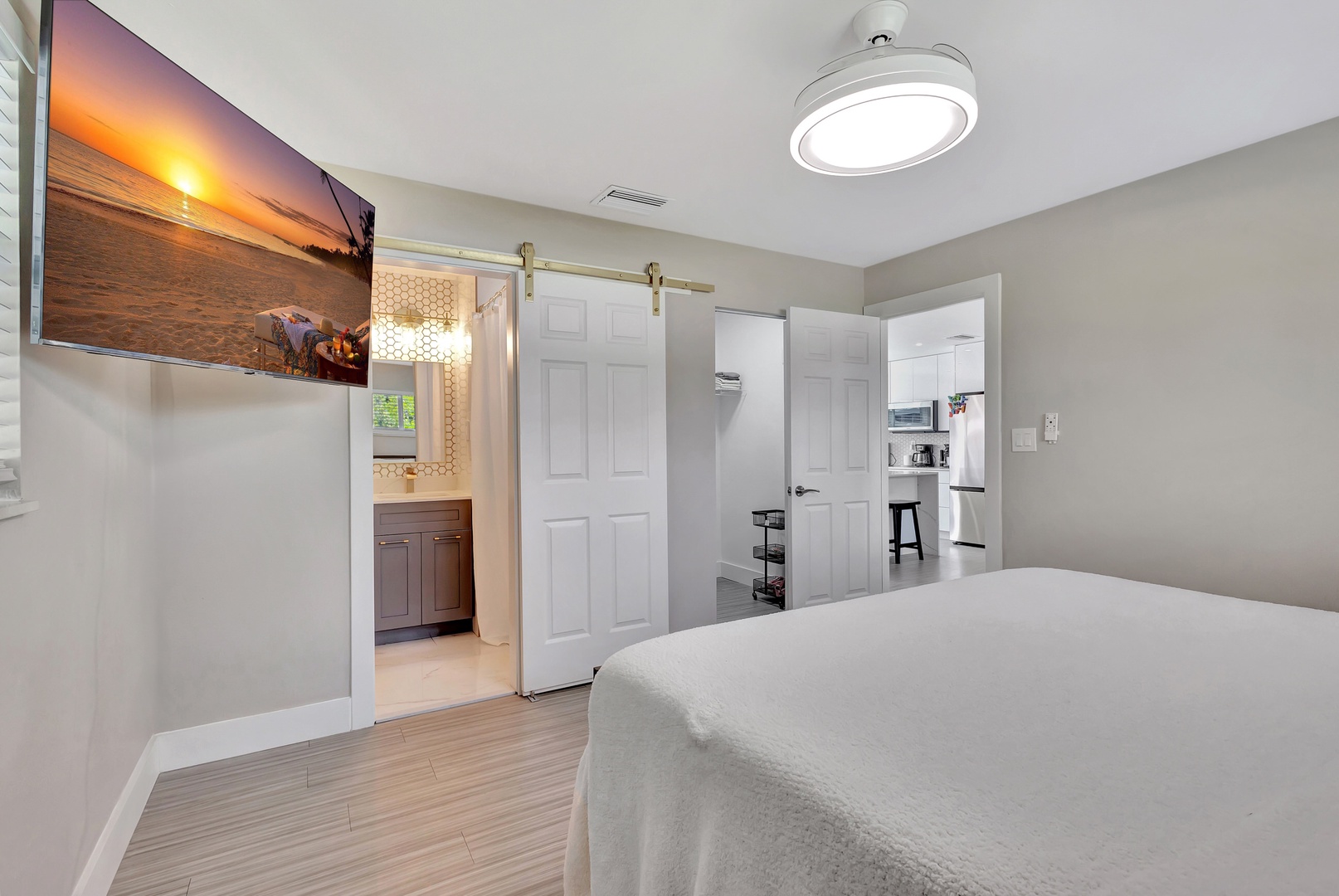 Bedroom 1 with king bed, Smart TV, and ensuite