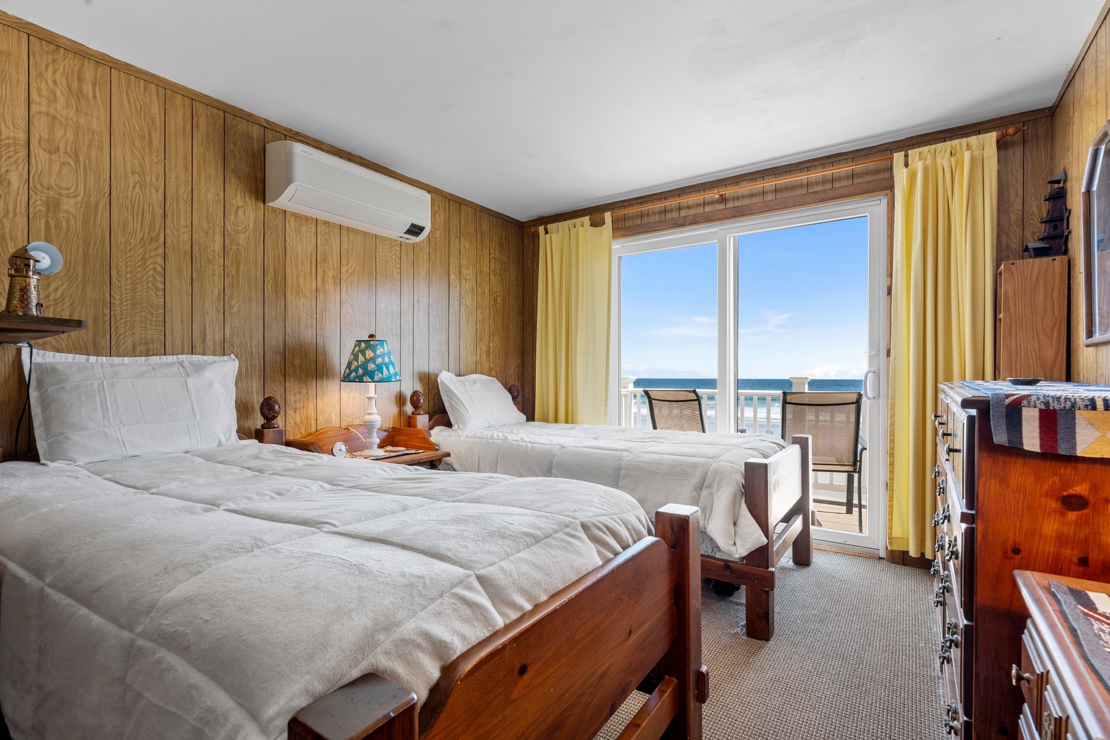 Bedroom 1 with 2 Twin beds, and balcony access