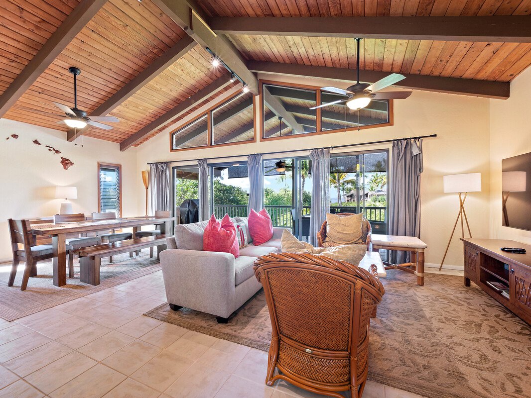 Open living space with ample seating, lanai, and Smart TV