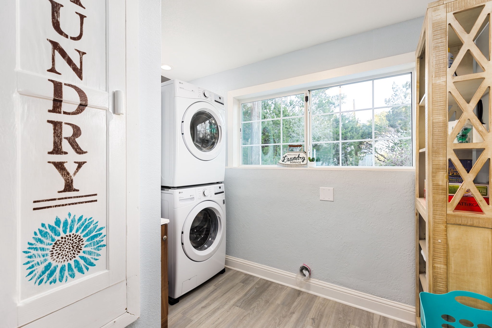 Private laundry is available for your stay, tucked away in the laundry room