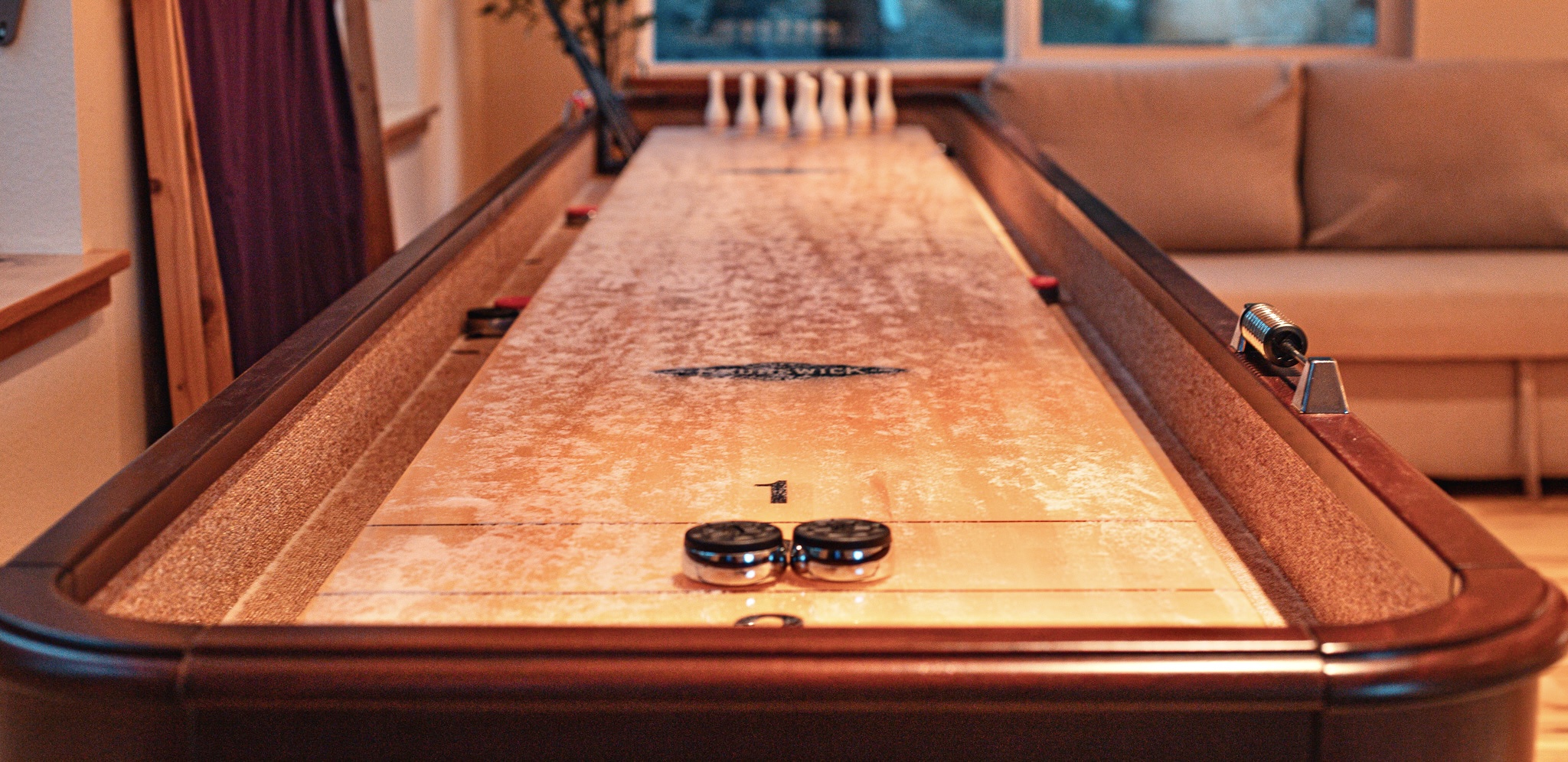 Challenge friends to a shuffleboard match in the game room #GameOn