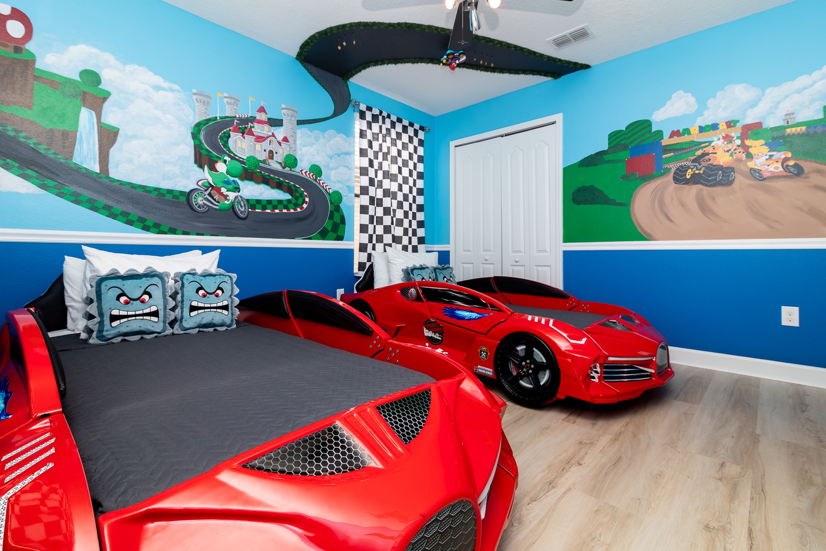 This Mario Kart bedroom with 2 twin beds is the ultimate finish line!