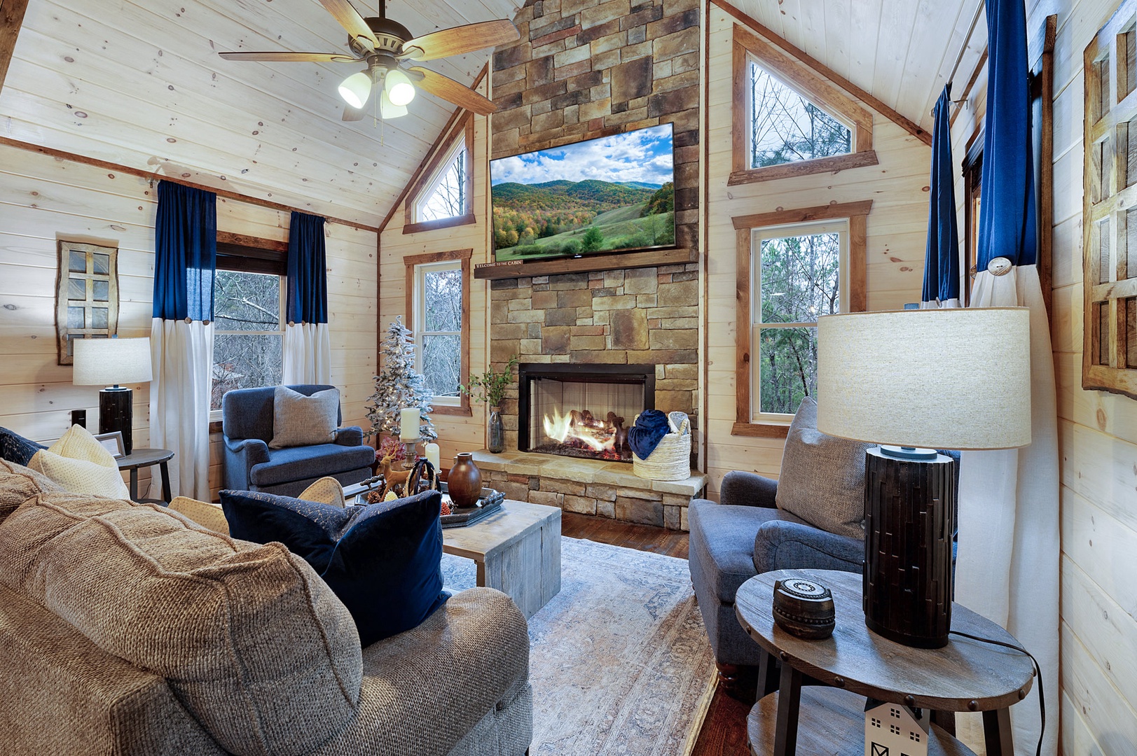 Modern spacious living area with TV and fireplace