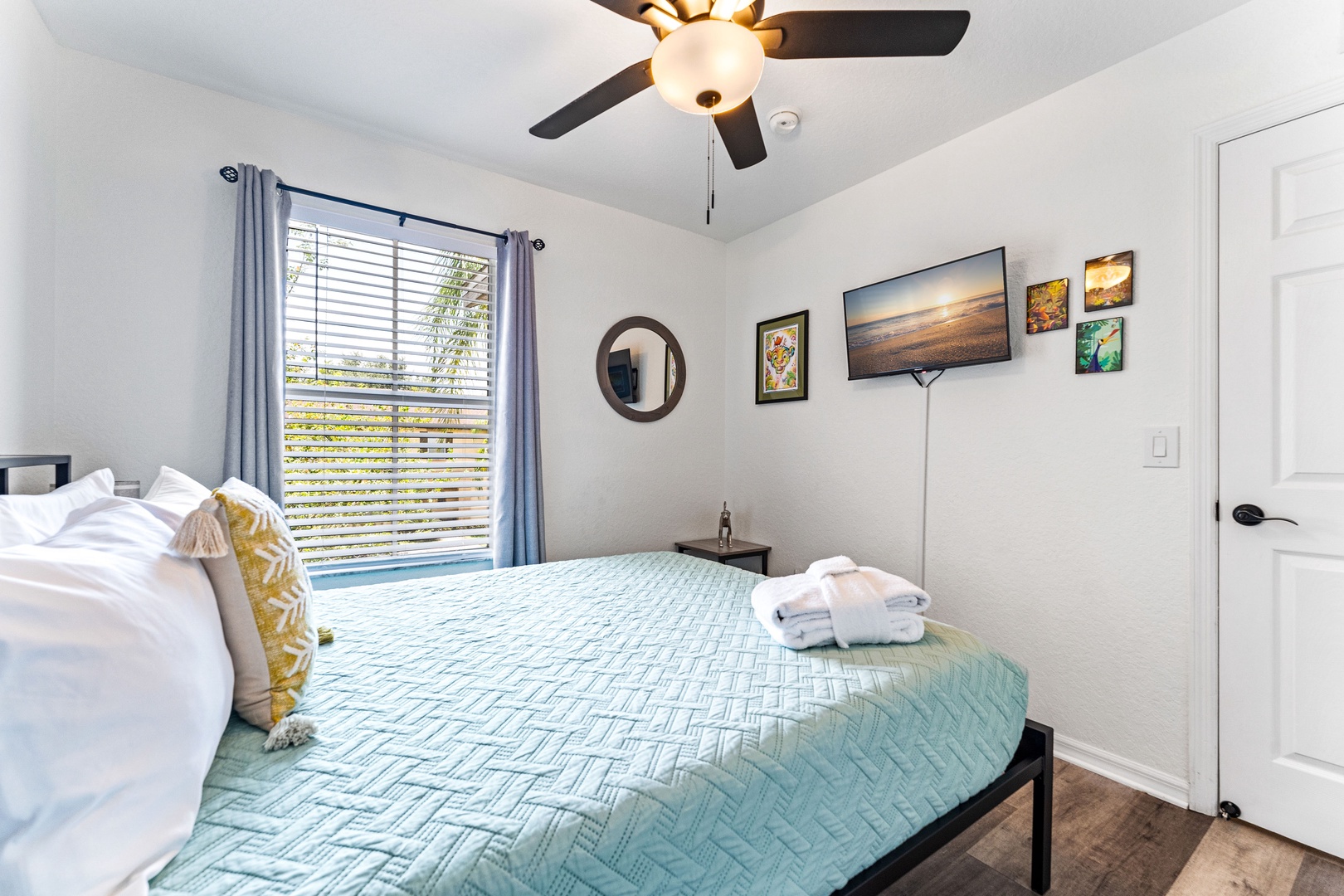 Recharge in this majestic 2nd-floor queen bedroom, offering a smart TV