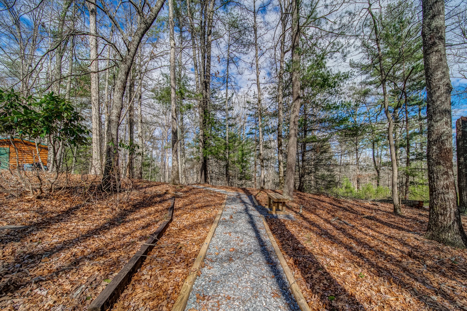 Escape from it all down a wooded pathway to the Firepit area