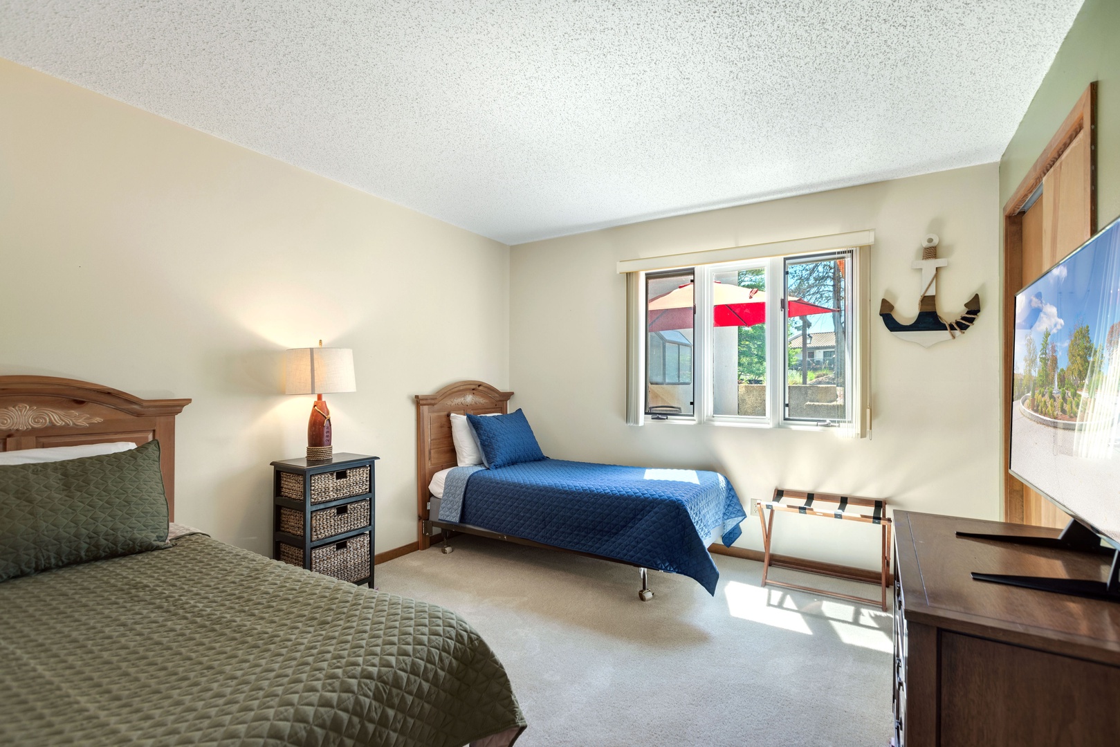 Unwind in the second bedroom, complete with two twin beds & Smart TV