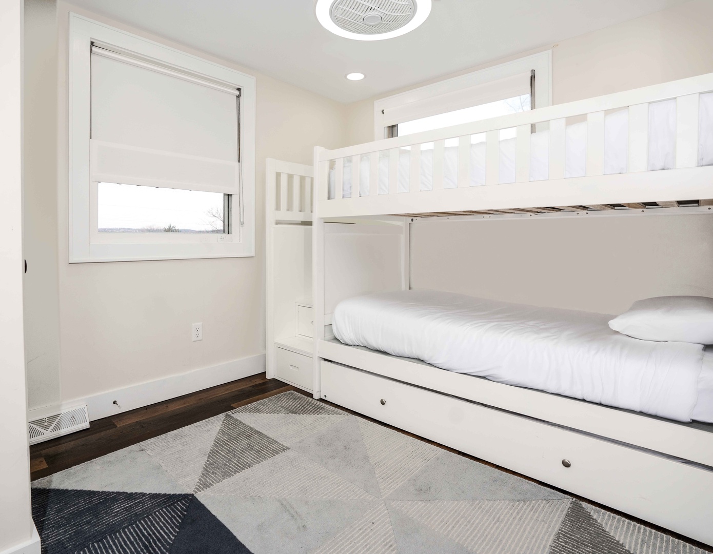 This 2nd floor bedroom offers twin bunks & a cozy twin trundle