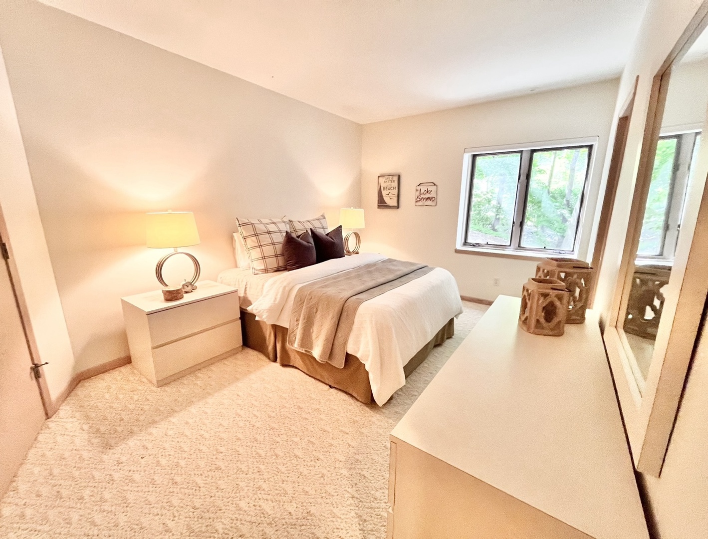 The 2nd of 3 walk-out lower-level queen bedrooms, with access to a Jack & Jill bath
