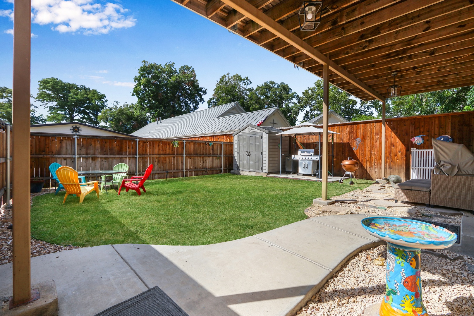 The whole family will love relaxing, dining, & playing in the fenced back yard
